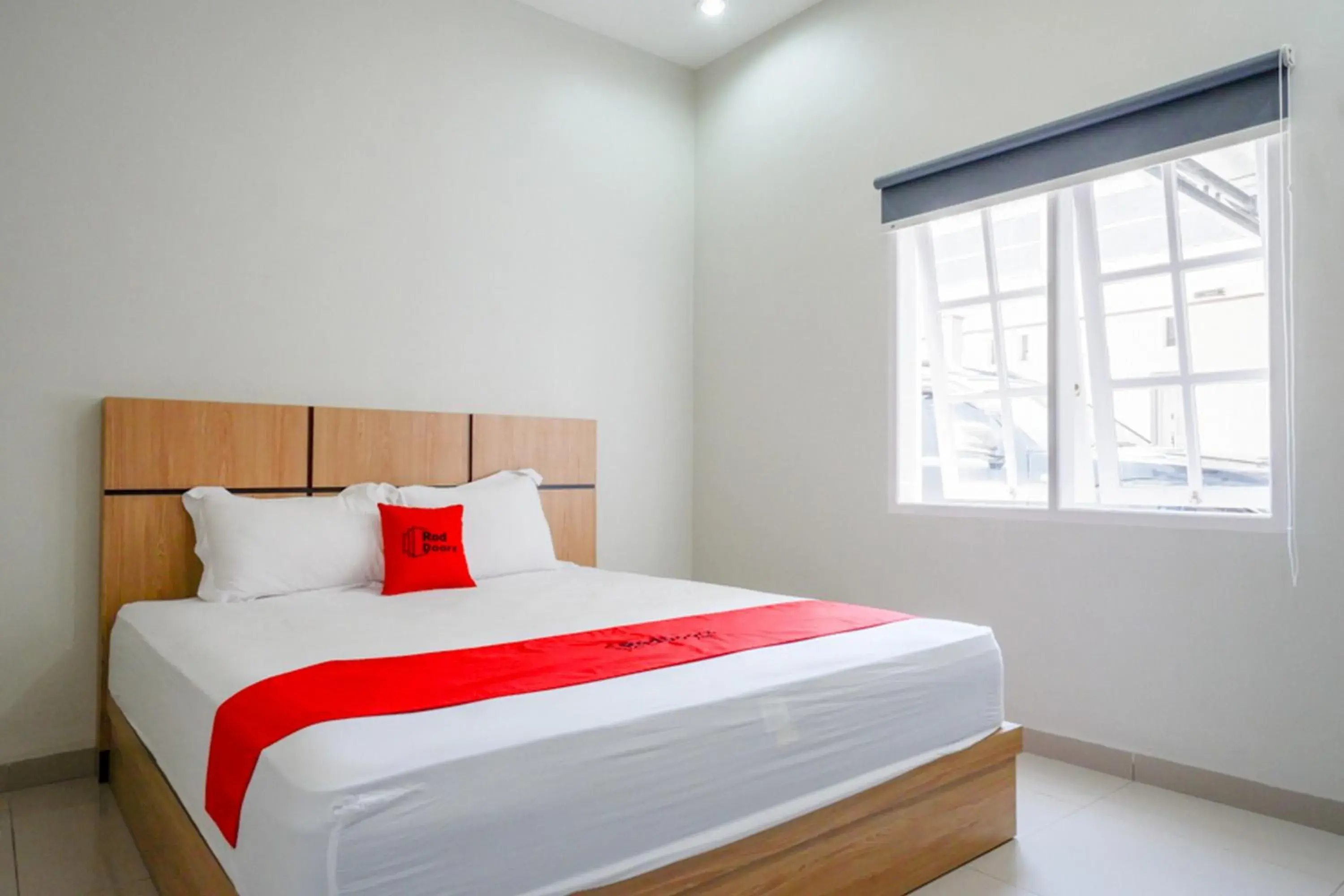 Bed in RedDoorz Syariah near Mutiara SIS Al Jufrie Airport Palu 2 Bed in RedDoorz Syariah near Mutiara SIS Al Jufrie Airport Palu 2