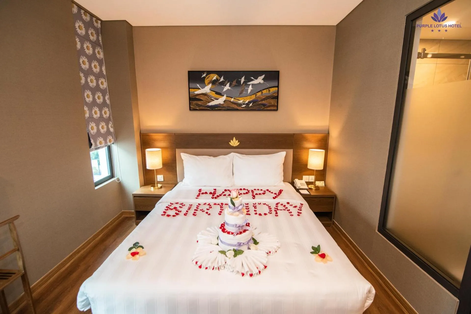 Bed in Purple Lotus Hotel