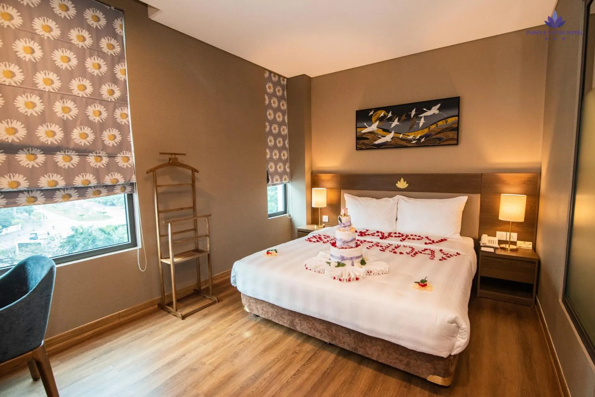 Bed in Purple Lotus Hotel