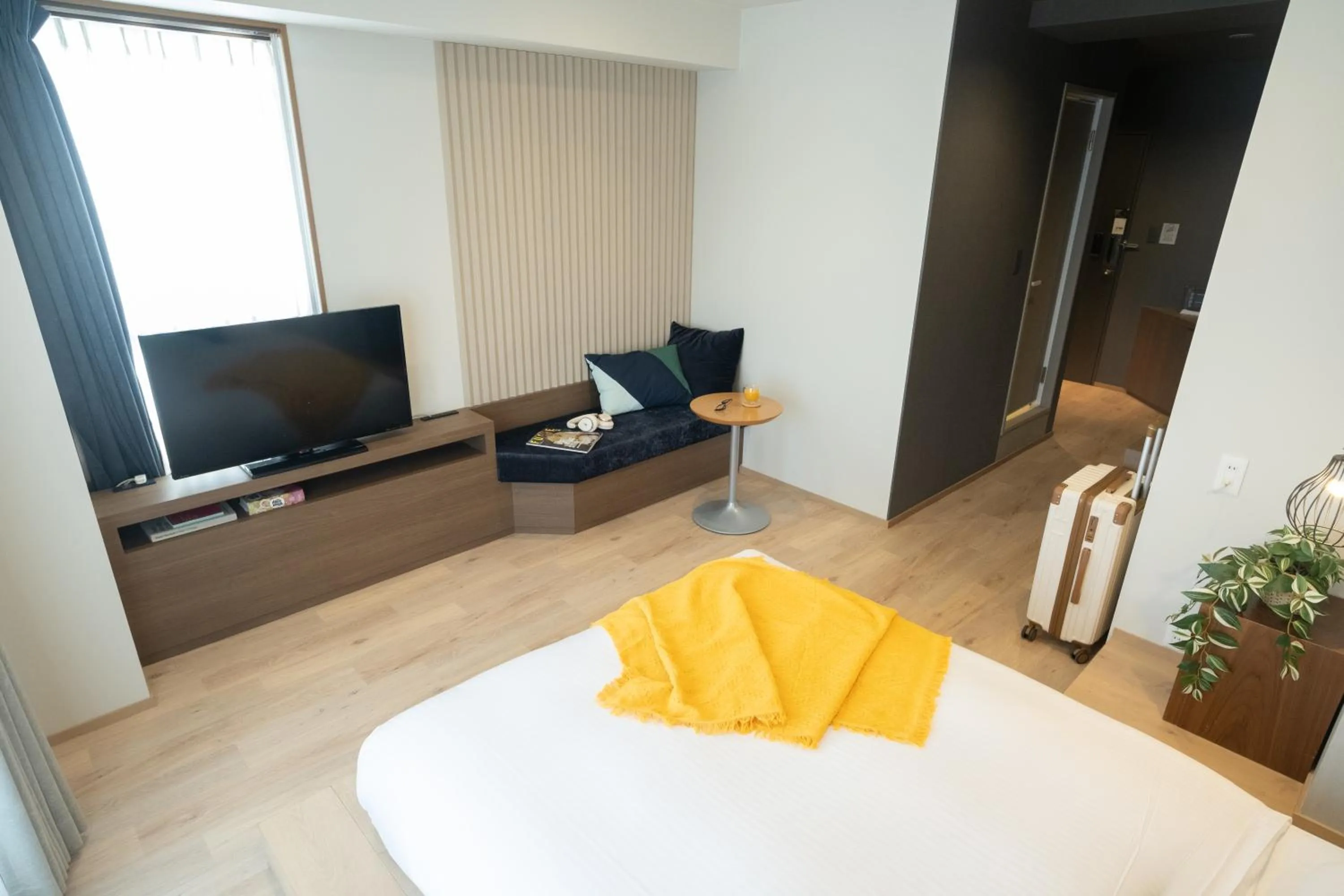 Bed in WAYFARER Kyoto Shijo