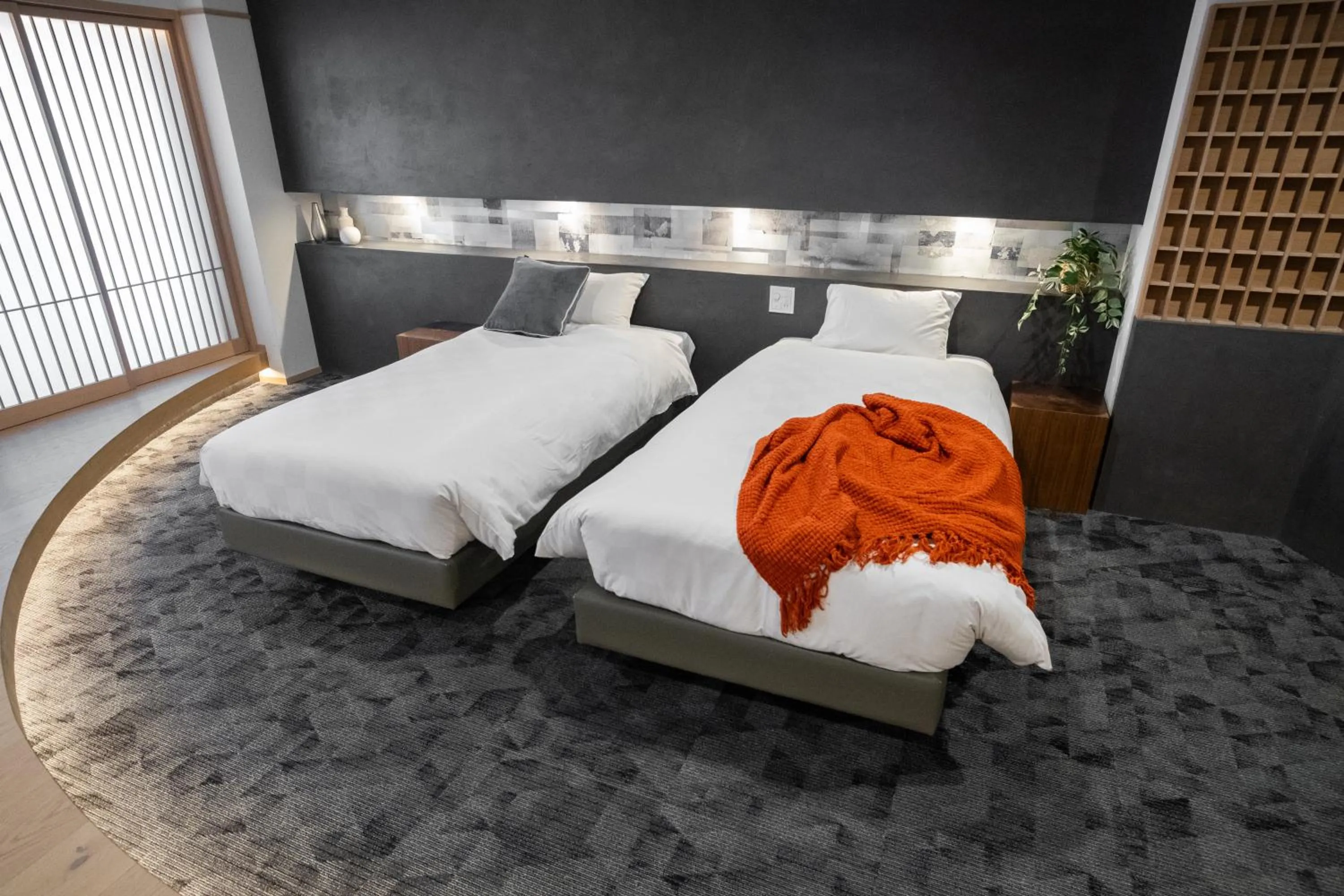Bed in WAYFARER Kyoto Shijo