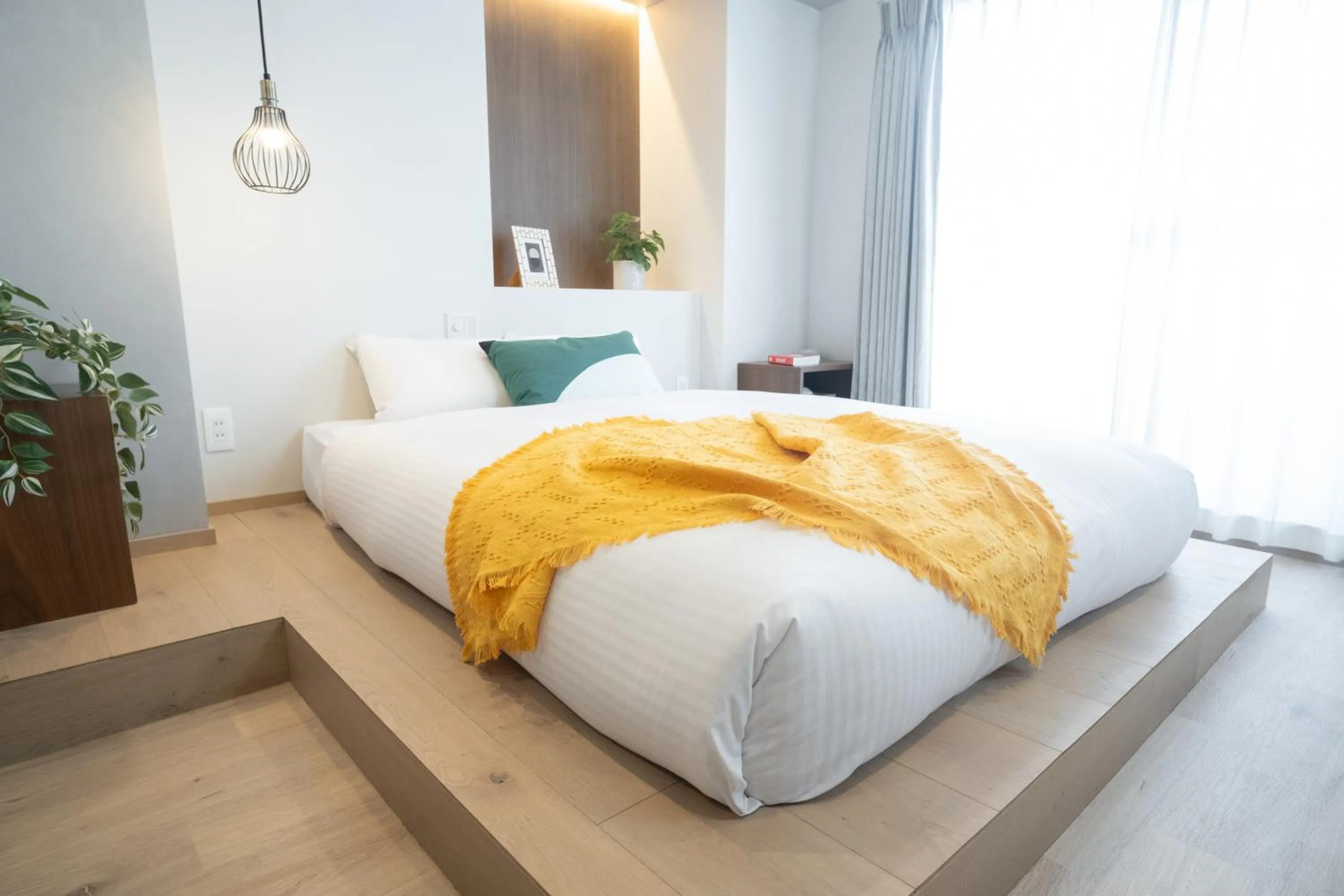 Bed in WAYFARER Kyoto Shijo