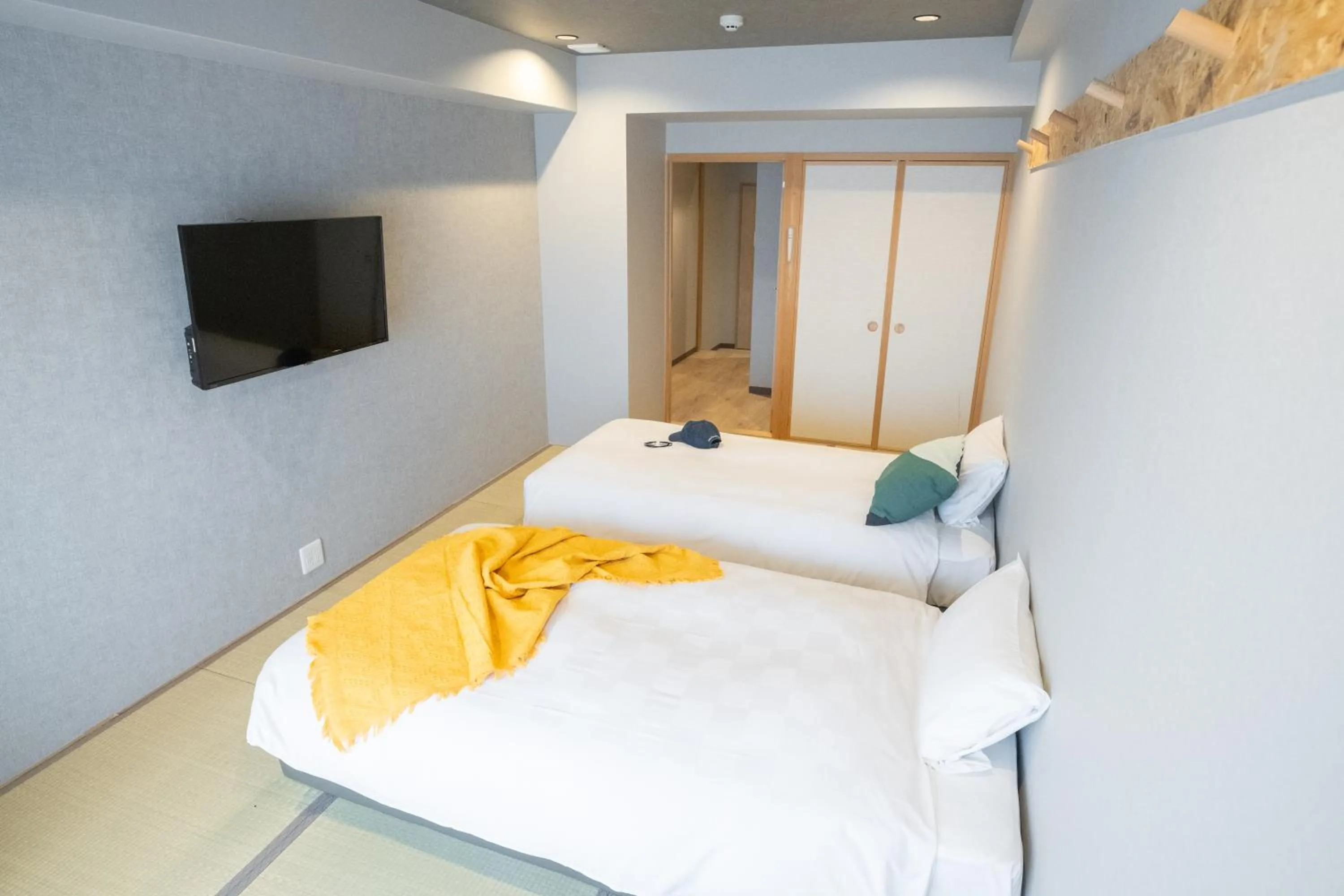 Bed in WAYFARER Kyoto Shijo