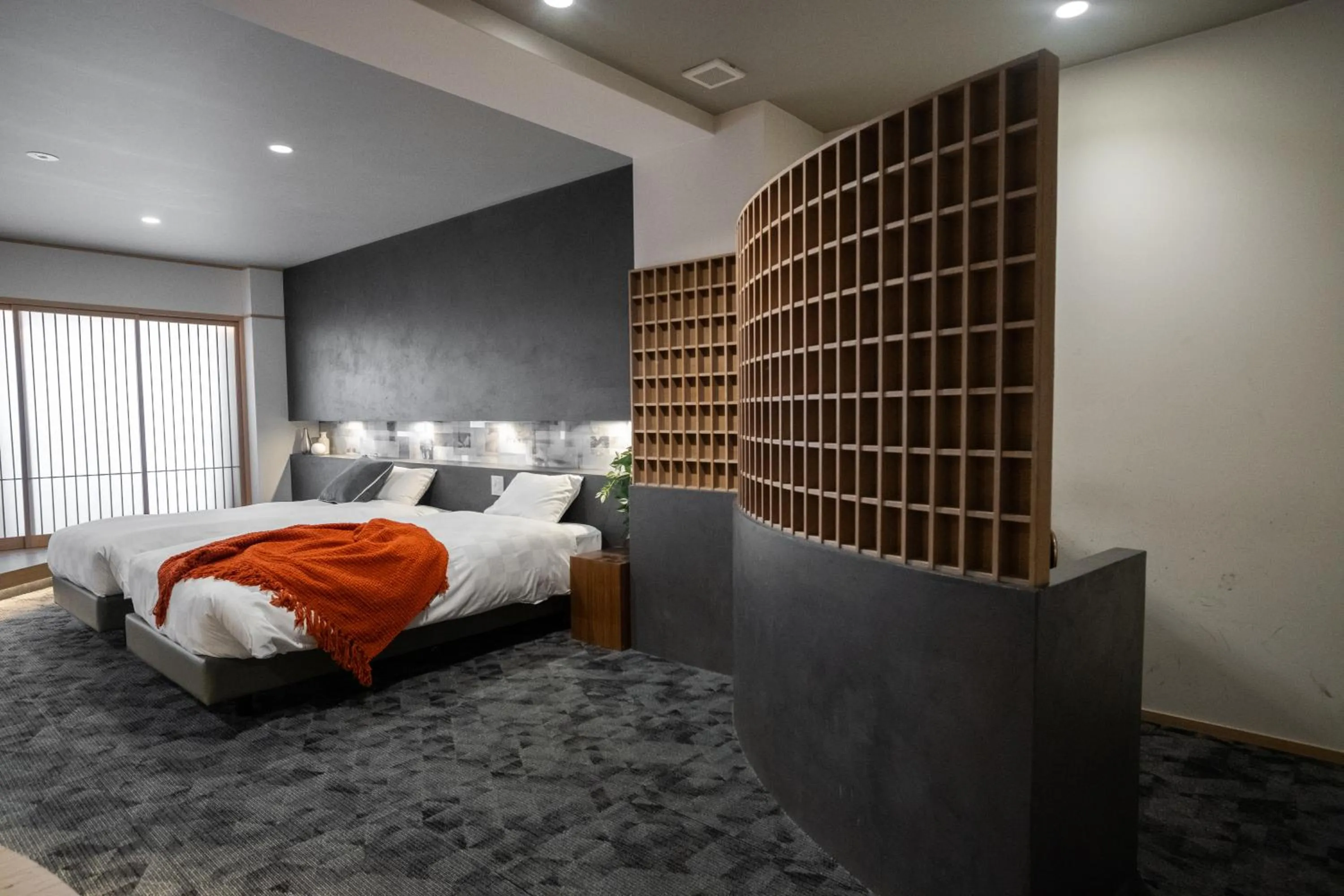 Bed in WAYFARER Kyoto Shijo