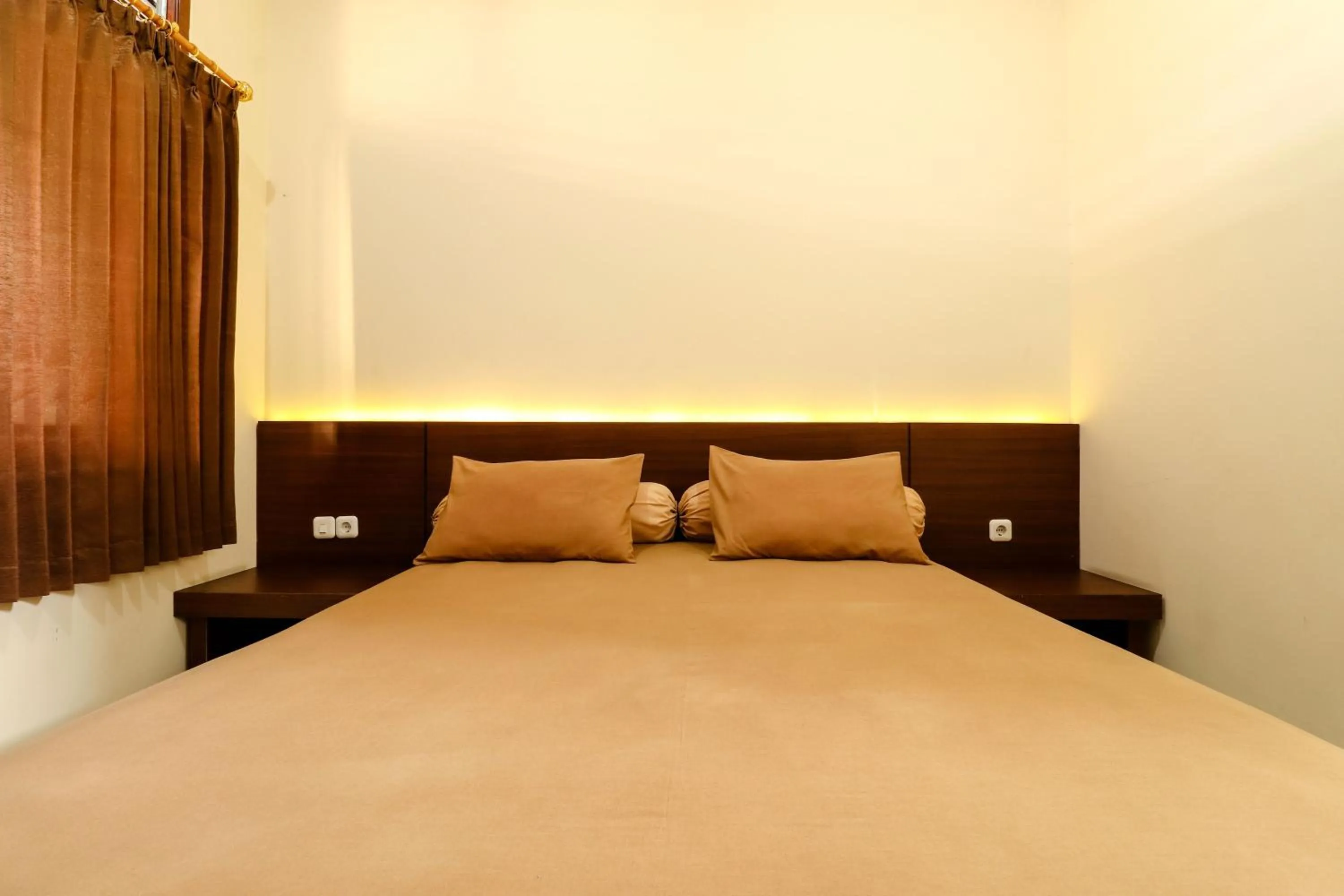 Bed in Hotel Bungurasih Syariah