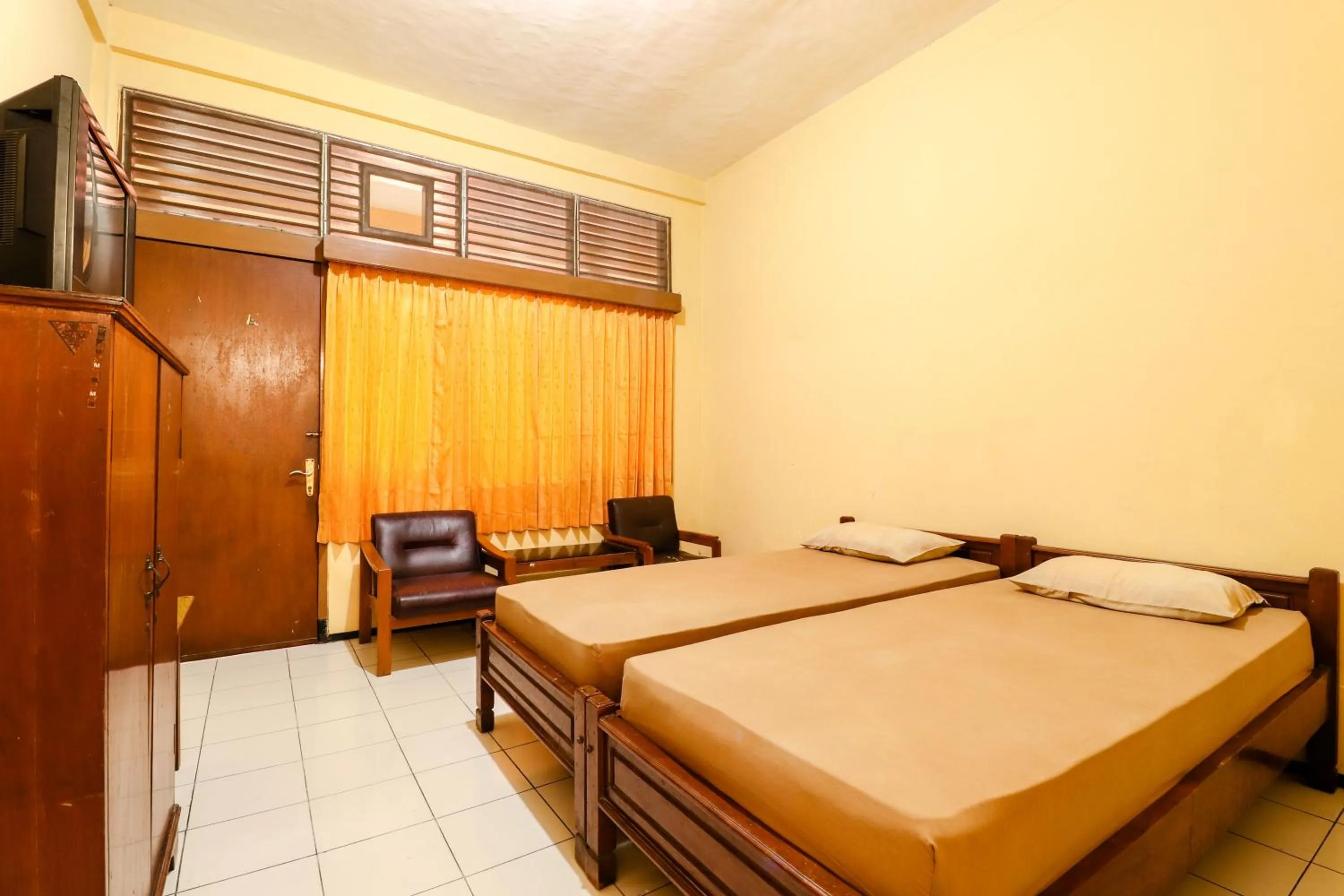 Bed in Hotel Bungurasih Syariah