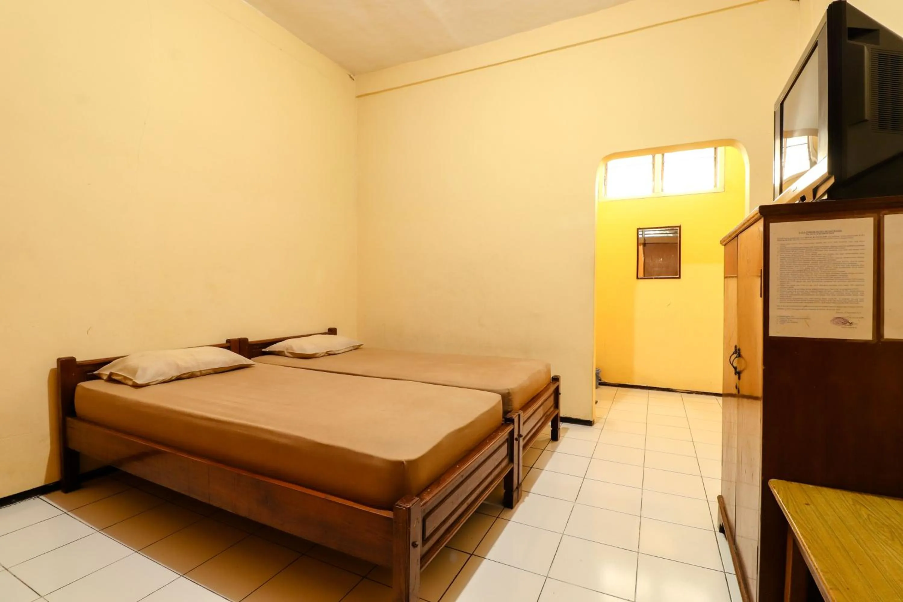 Bed in Hotel Bungurasih Syariah