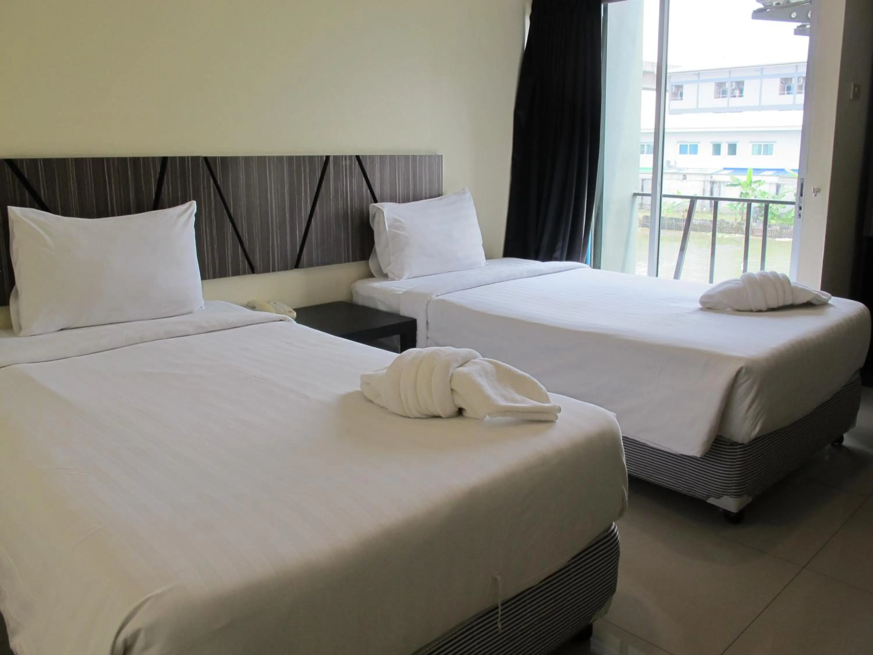 Bed in The Airy Residence