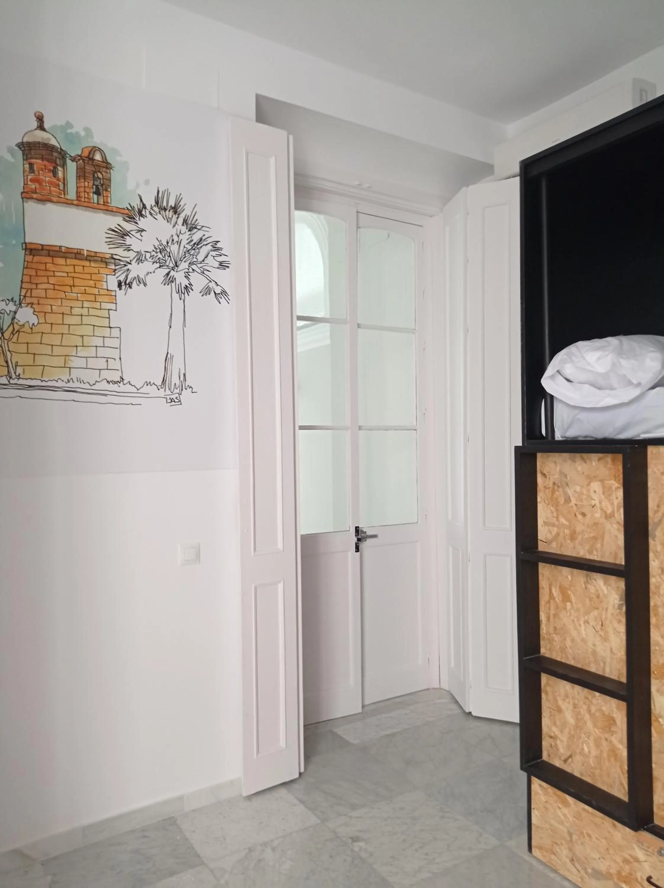 Decorative detail, Bed in Planeta Cadiz Hostel