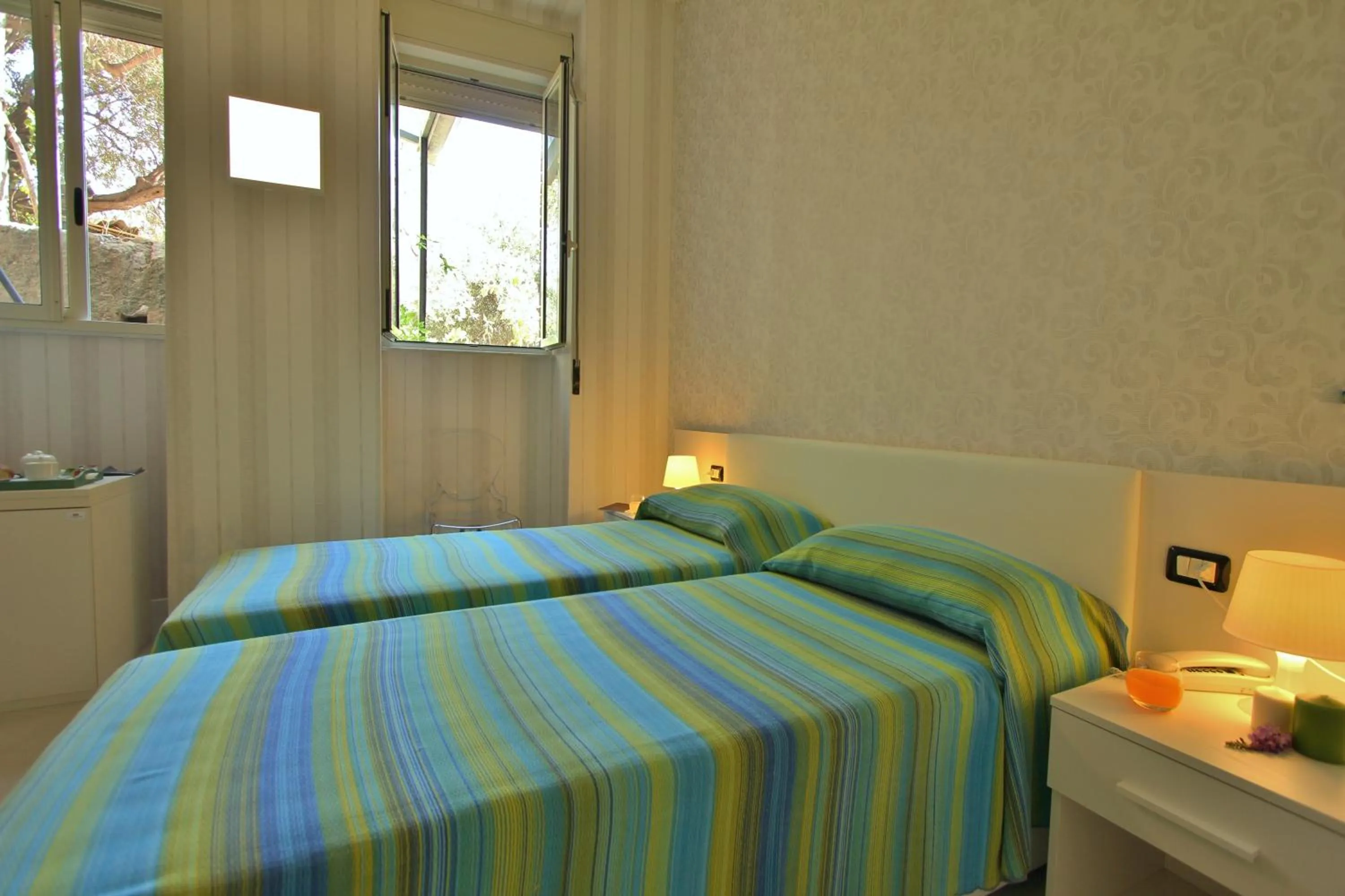 Photo of the whole room, Bed in Hotel Baia Azzurra