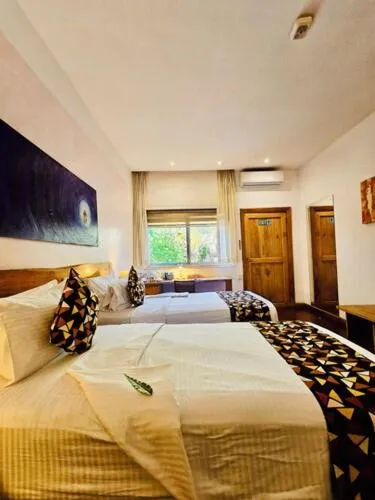 Bed in La Villa Boutique Hotel