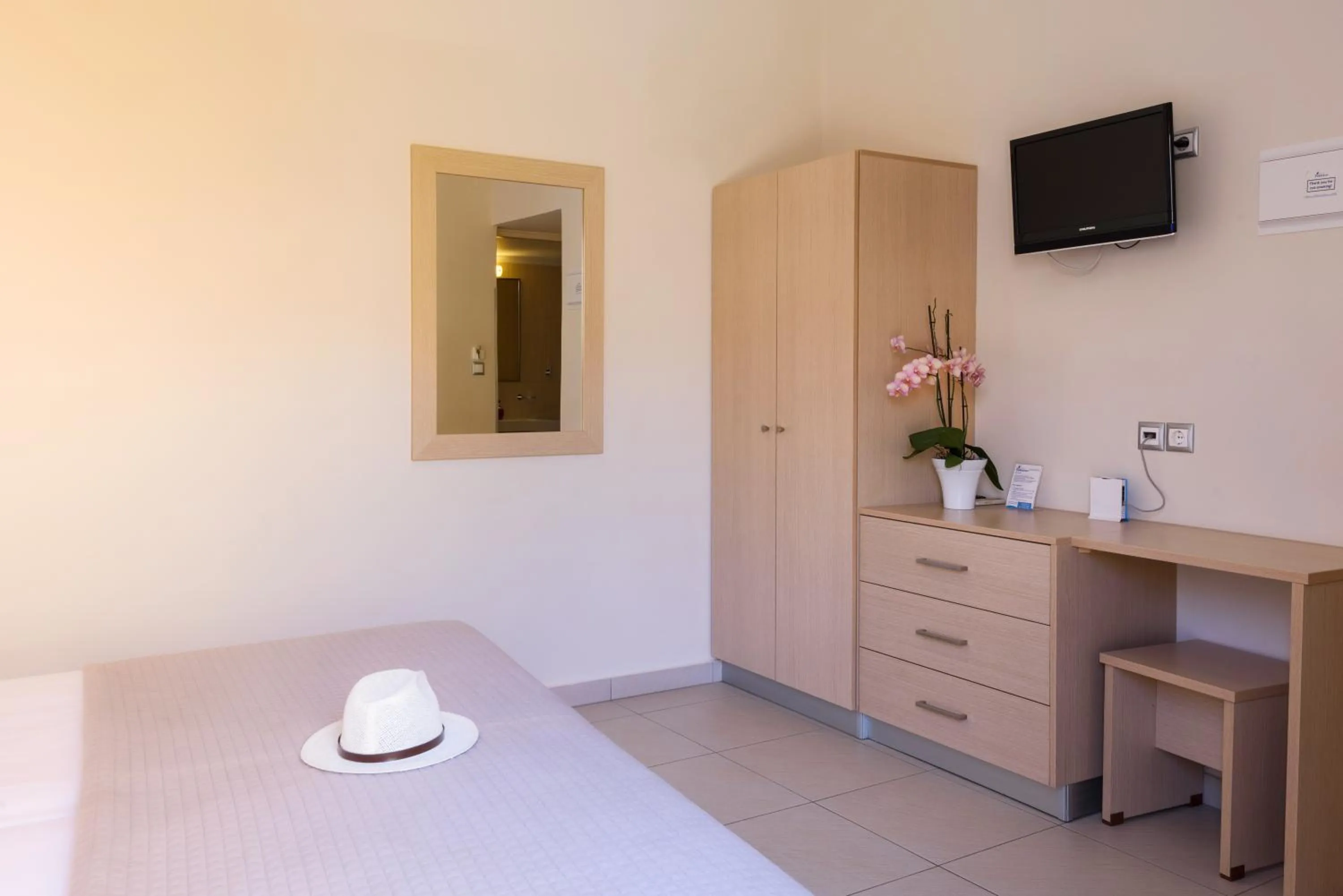 Bed in Hotel Poseidon