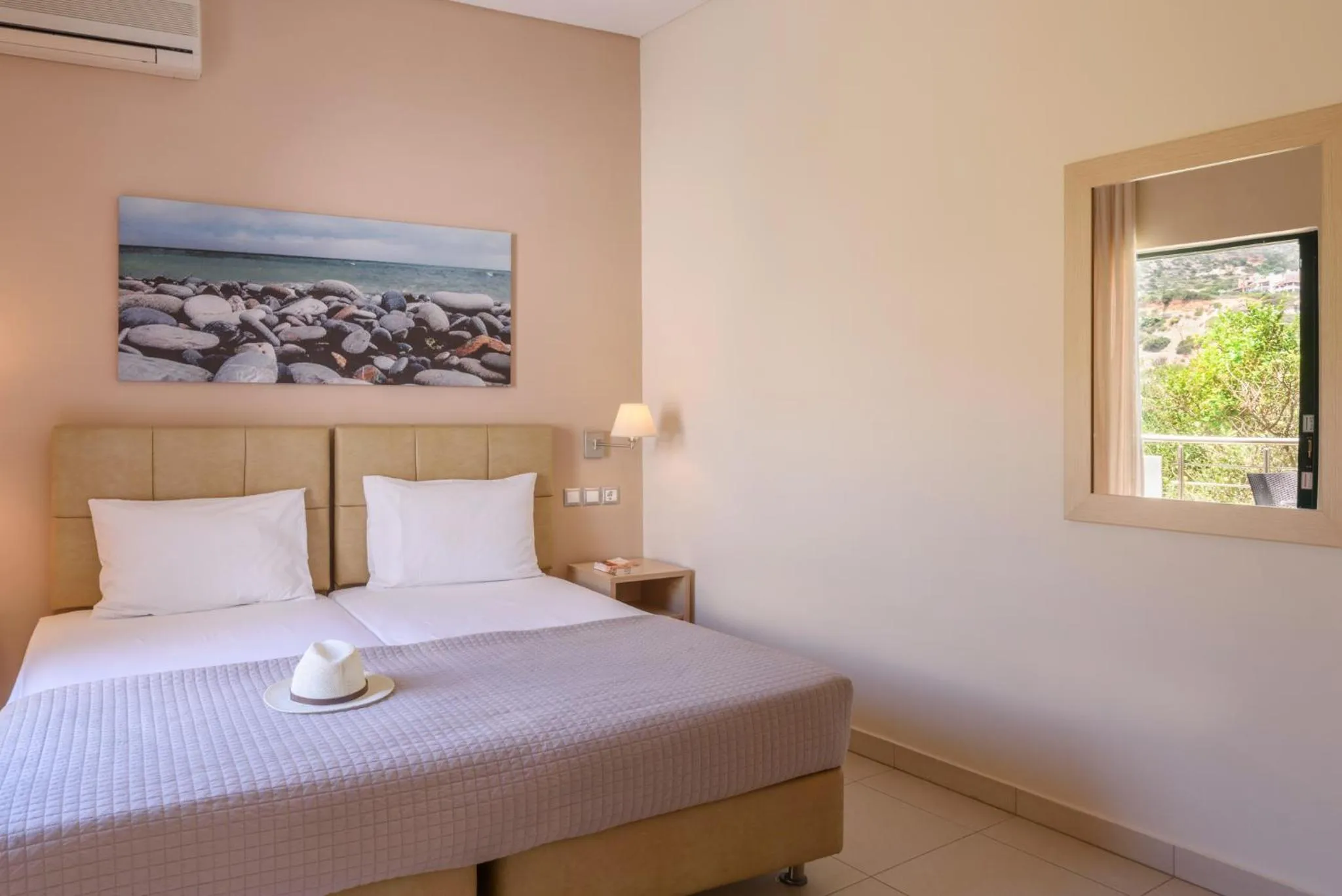 Bed in Hotel Poseidon