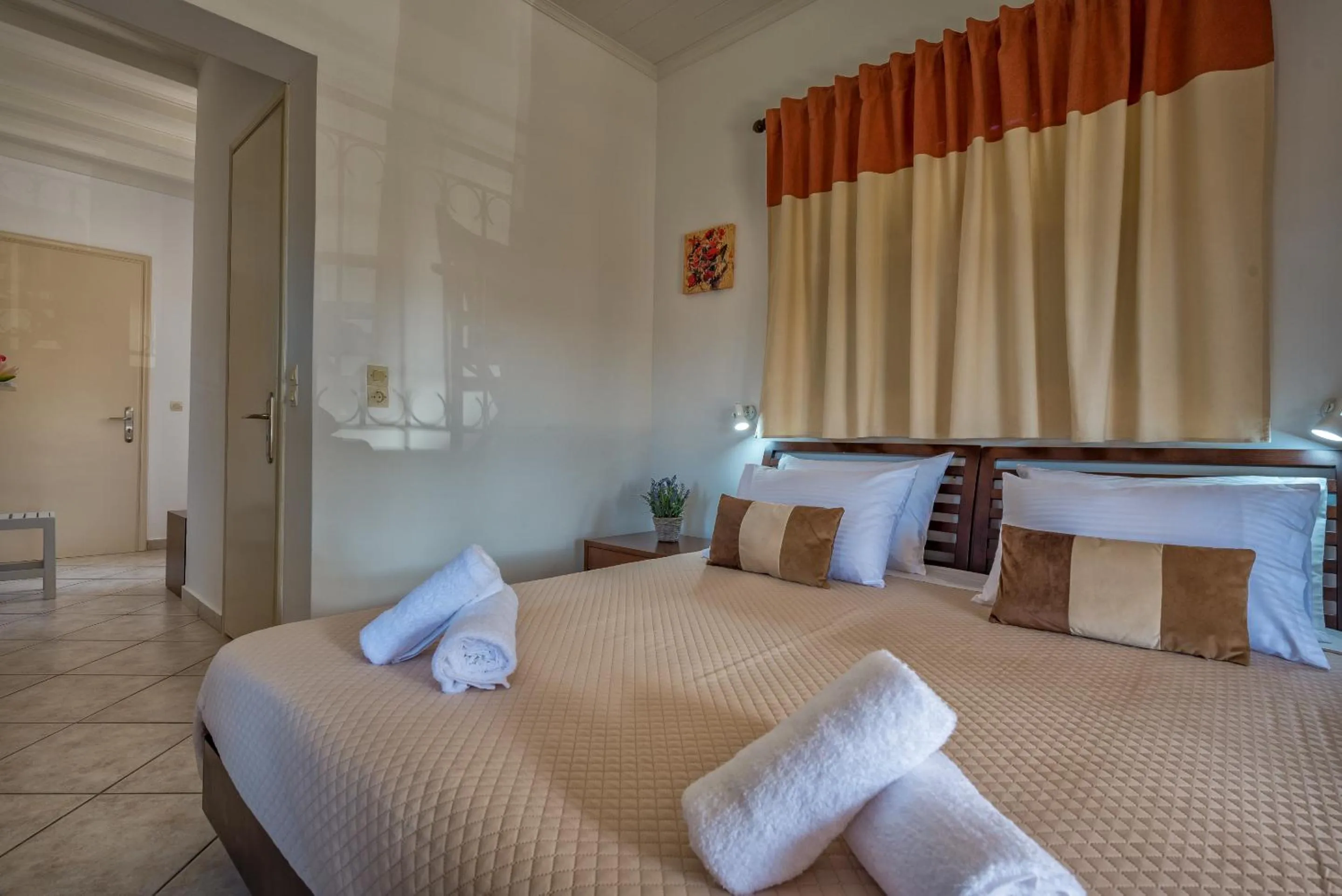 Bed in Zarkadis Beach Apartments