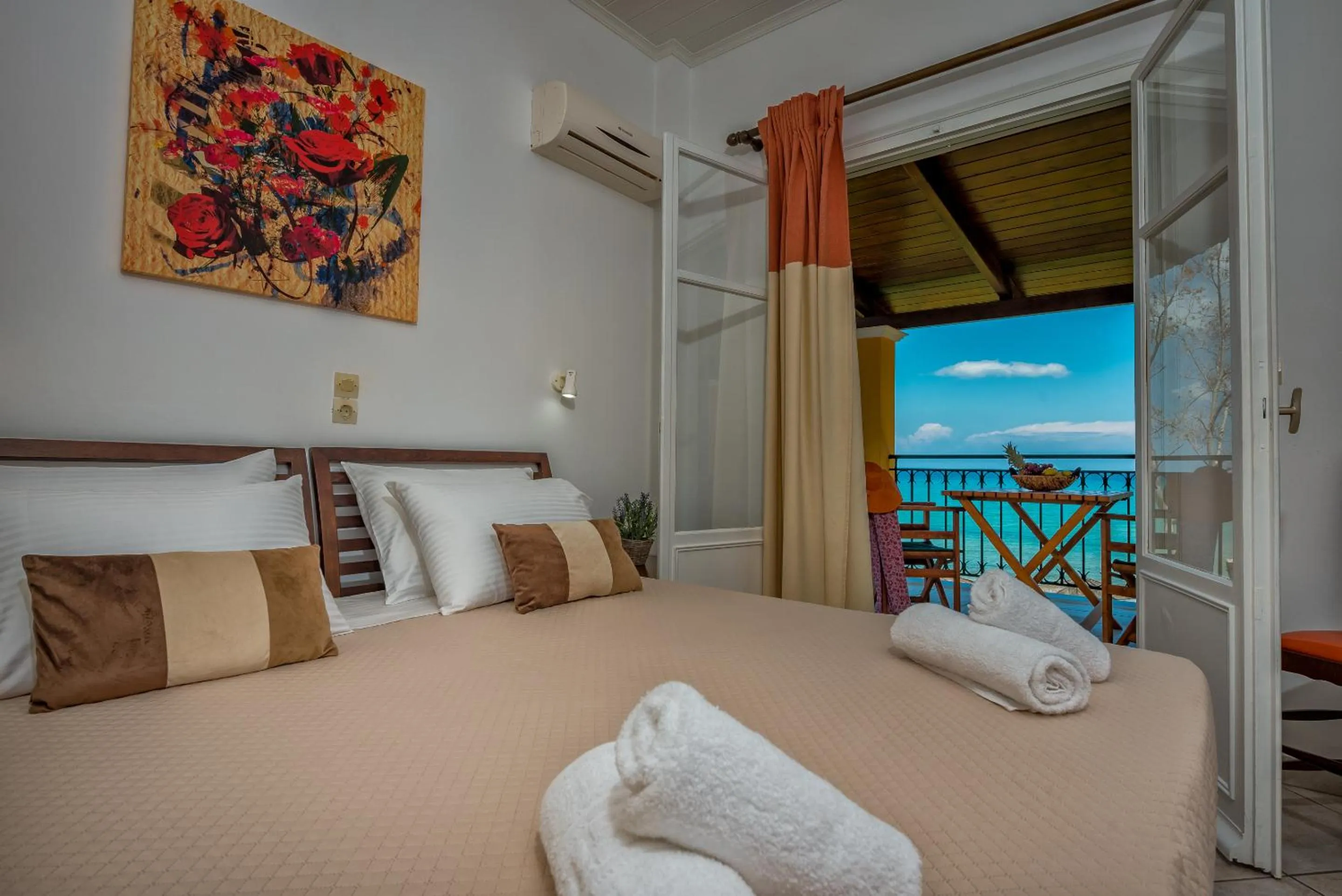 Bed in Zarkadis Beach Apartments