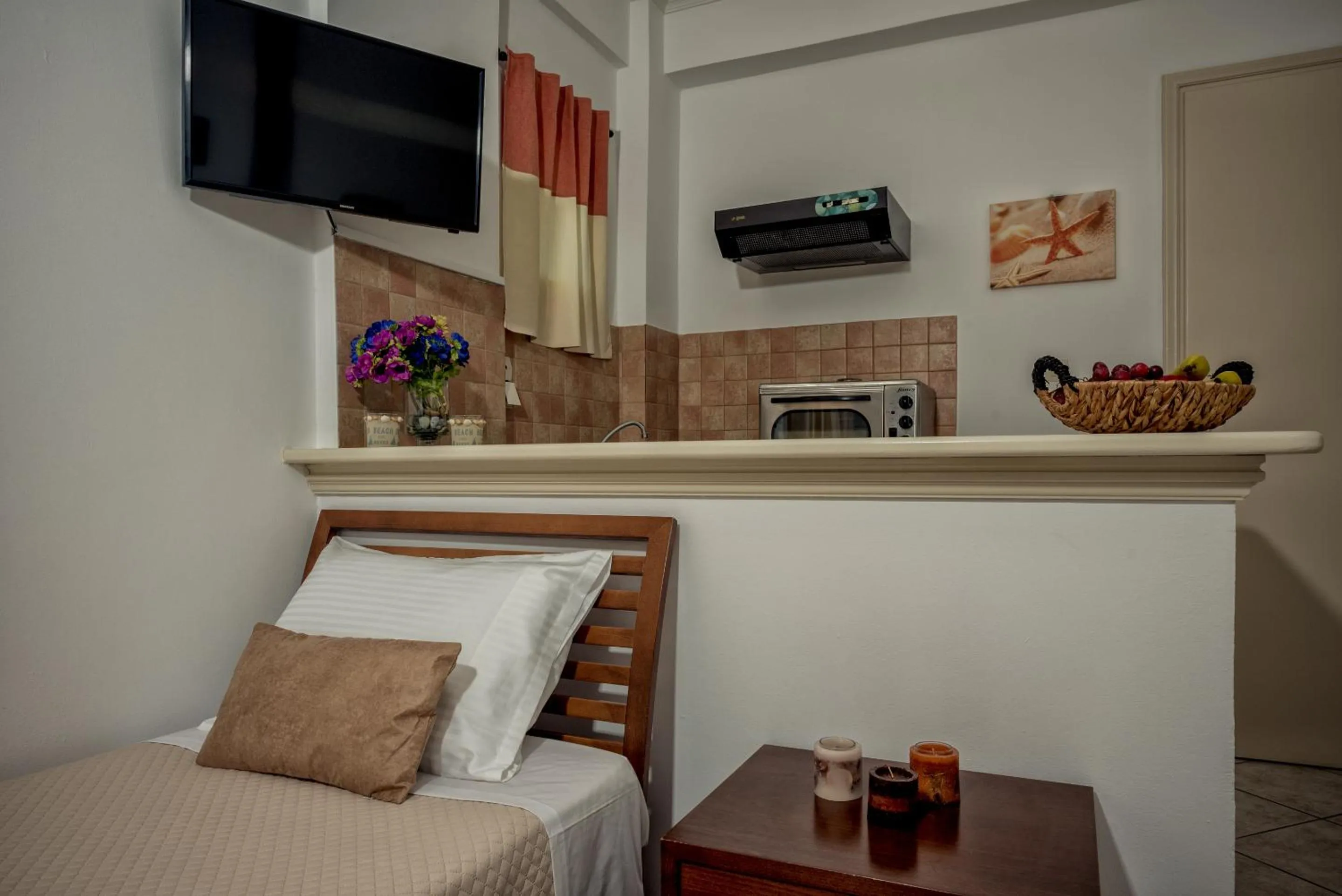 Bed in Zarkadis Beach Apartments