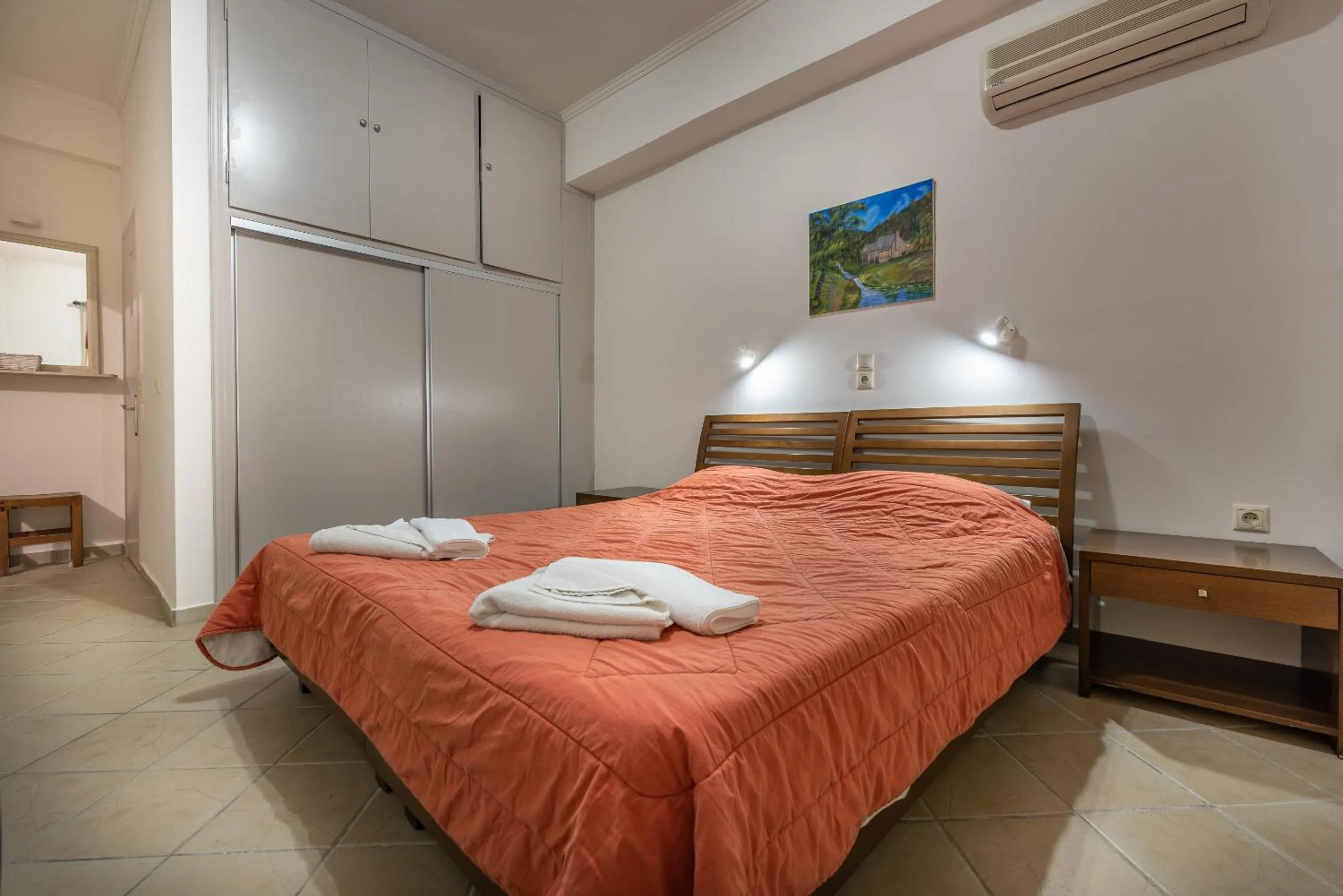 Bed in Zarkadis Beach Apartments