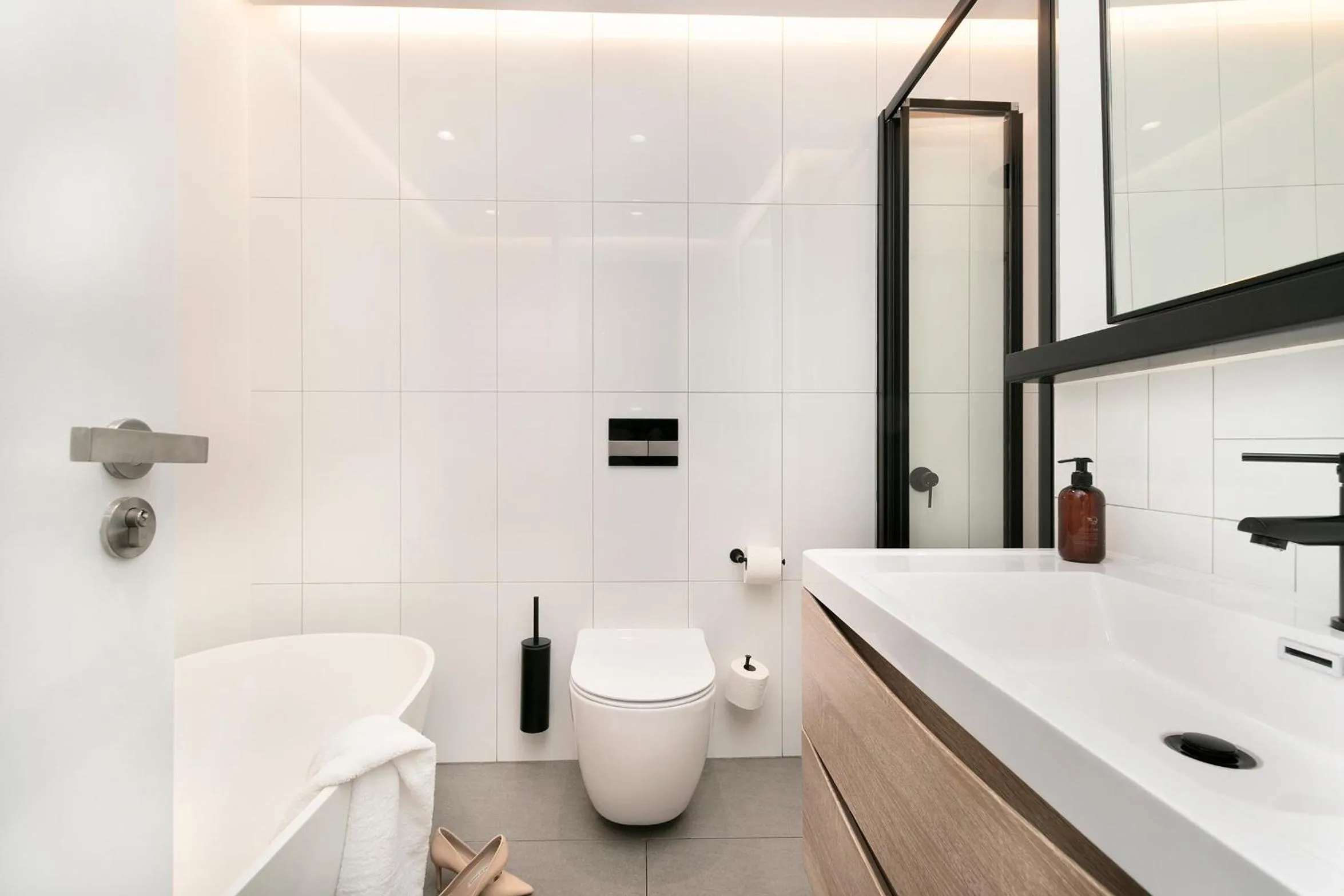 Bathroom in Latitude Aparthotel by Totalstay