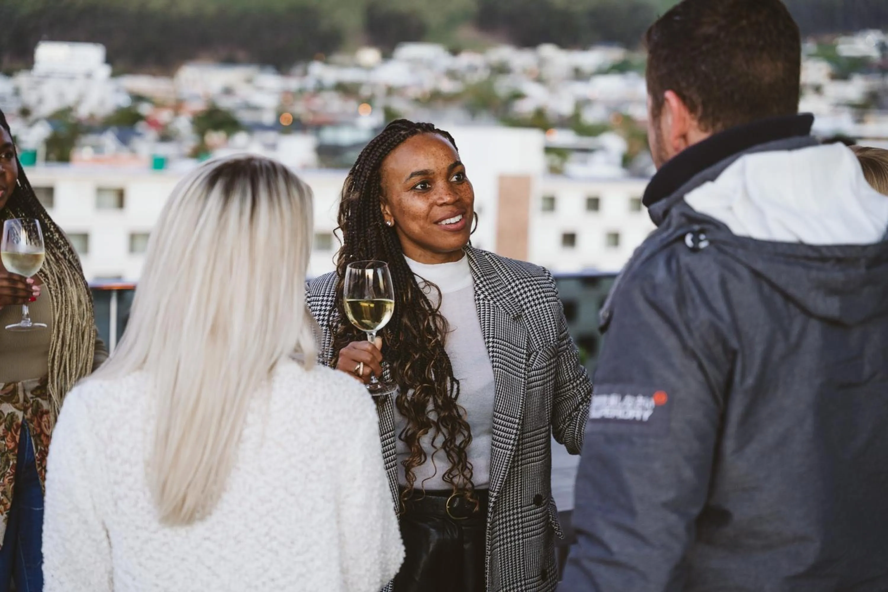 group of guests in Latitude Aparthotel by Totalstay