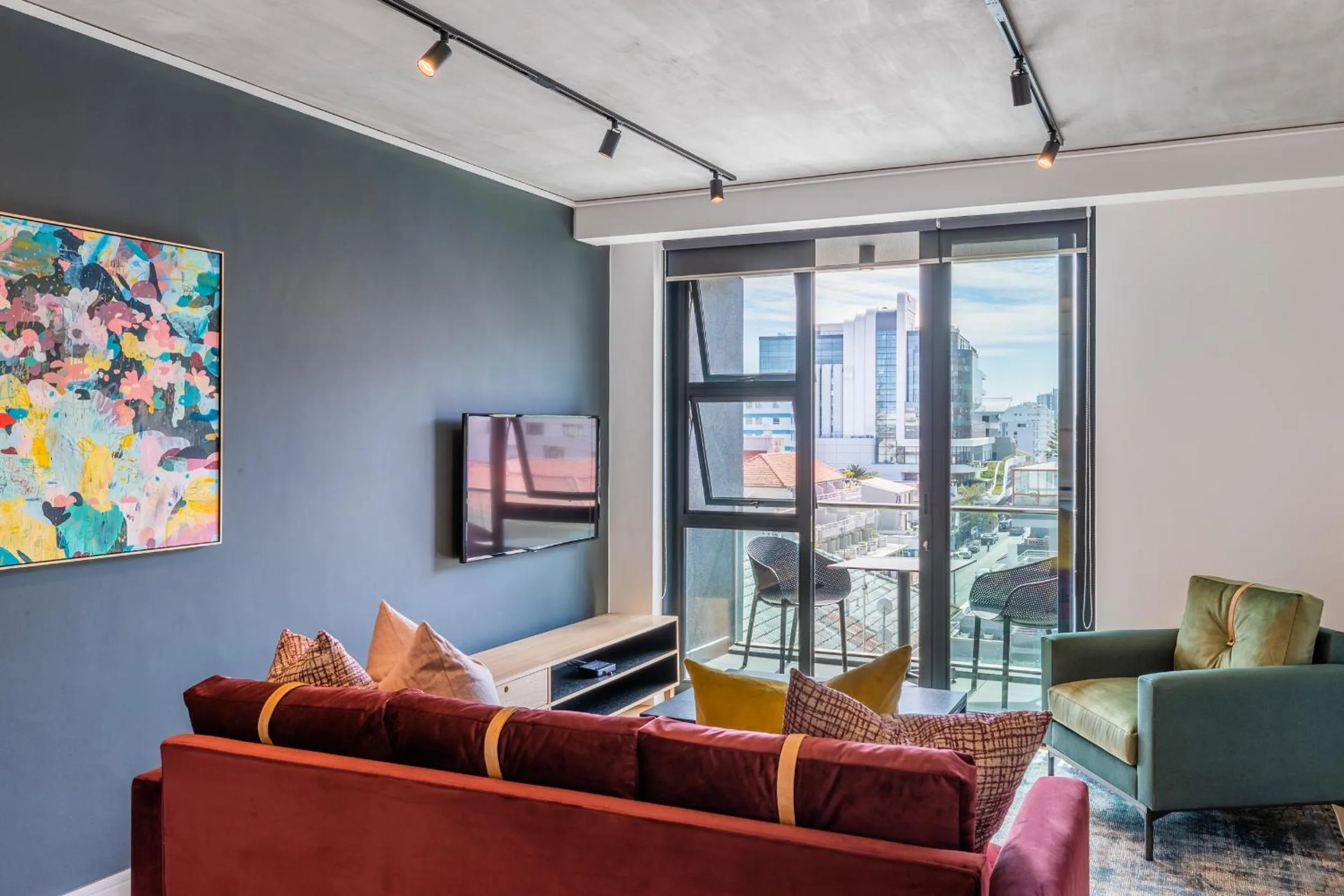 Seating area in Latitude Aparthotel by Totalstay