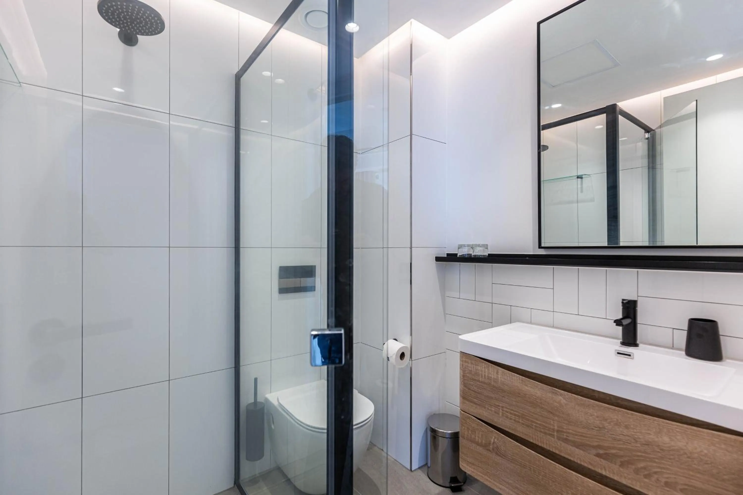 Bathroom in Latitude Aparthotel by Totalstay
