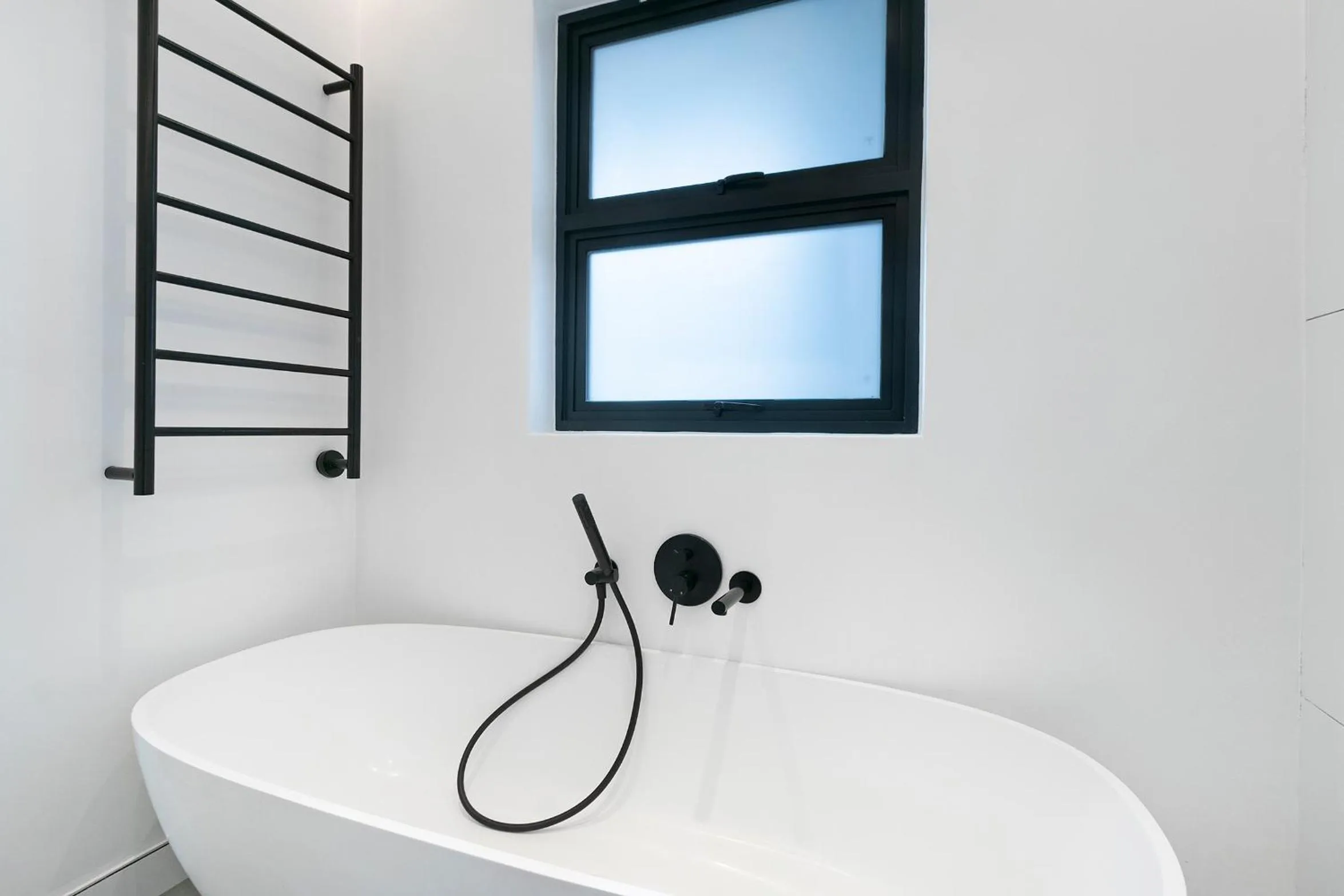 Bathroom in Latitude Aparthotel by Totalstay