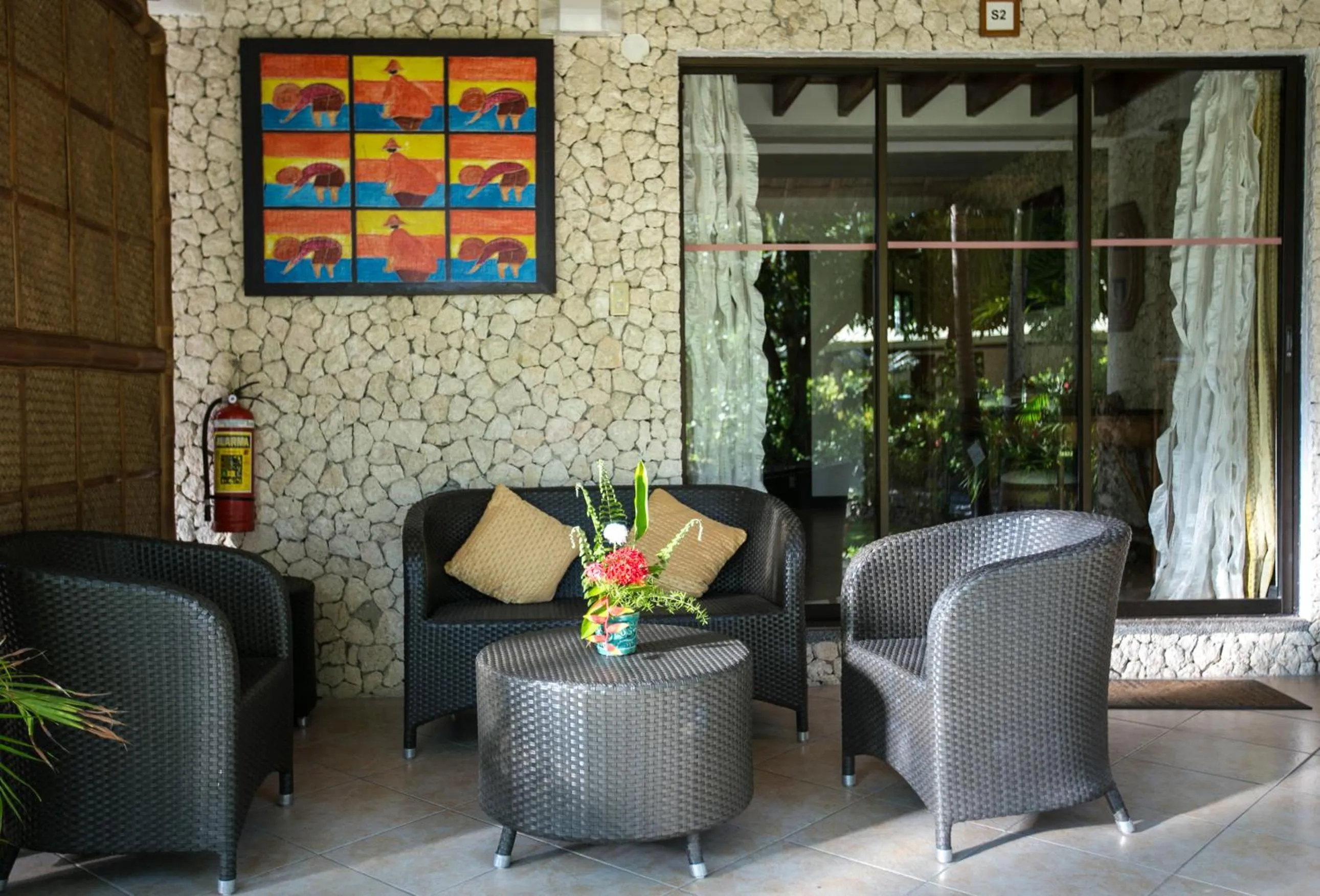 Seating area in Dolphin House Resort Moalboal