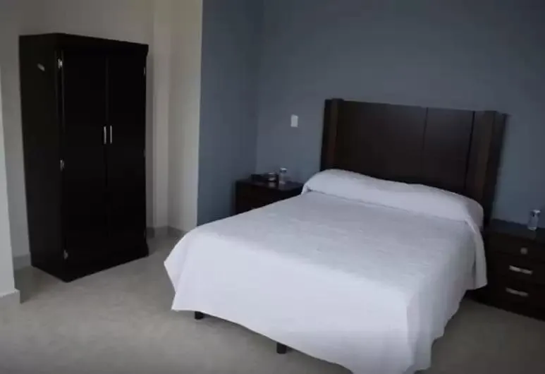 Bed in HOTEL CANDELERO