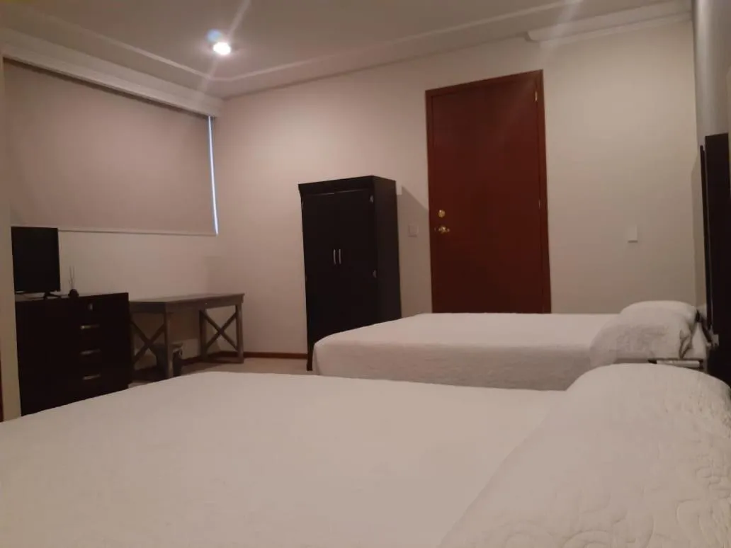 Bed in HOTEL CANDELERO