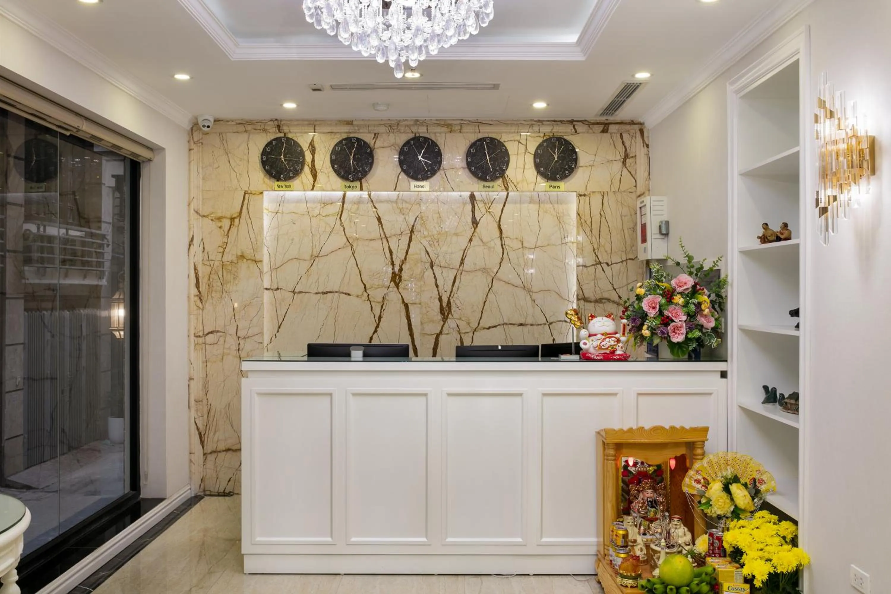 Communal lounge/ TV room in C'Bon Hotel Do Quang