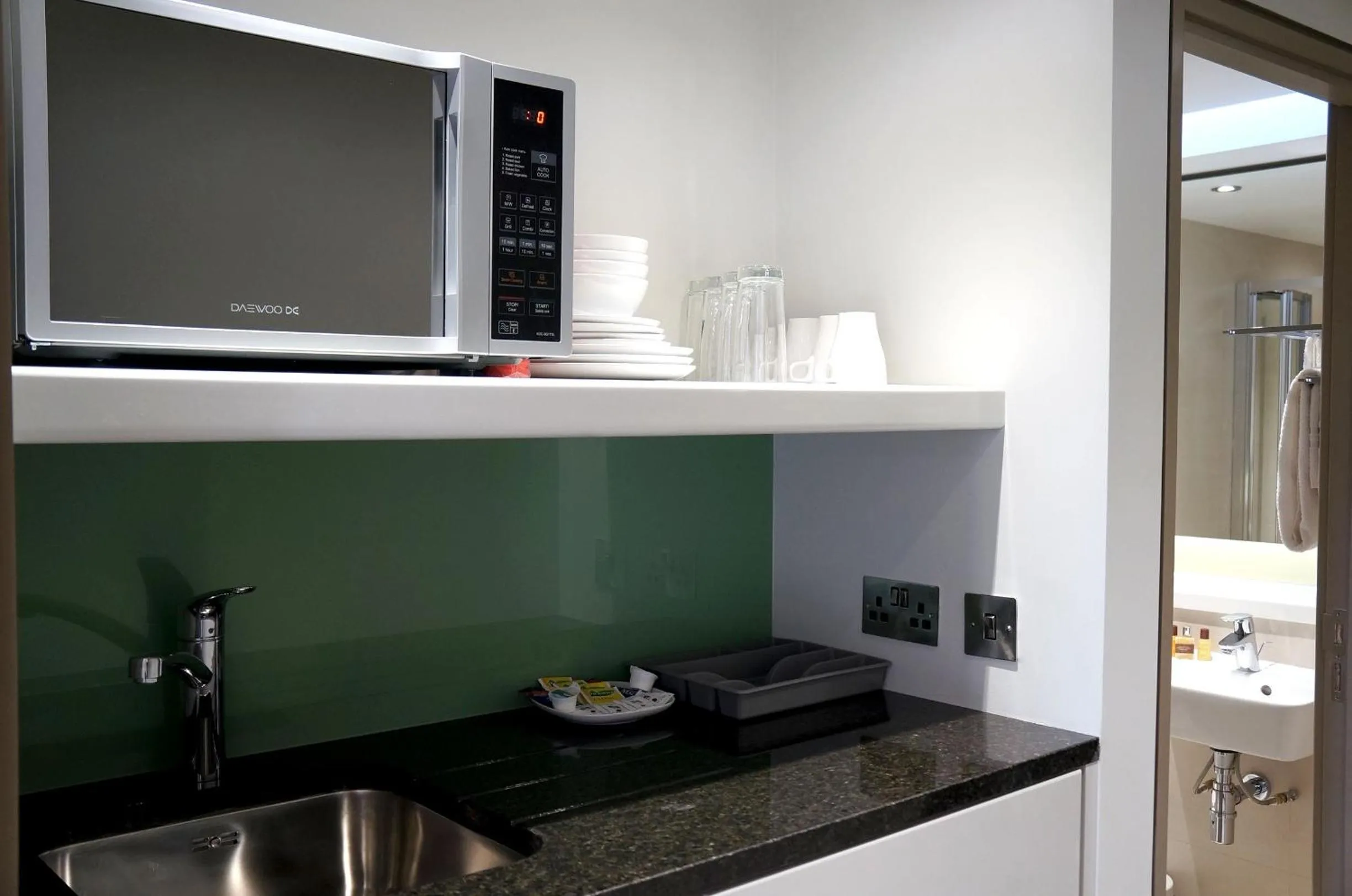 Kitchen or kitchenette in Arch Hotel