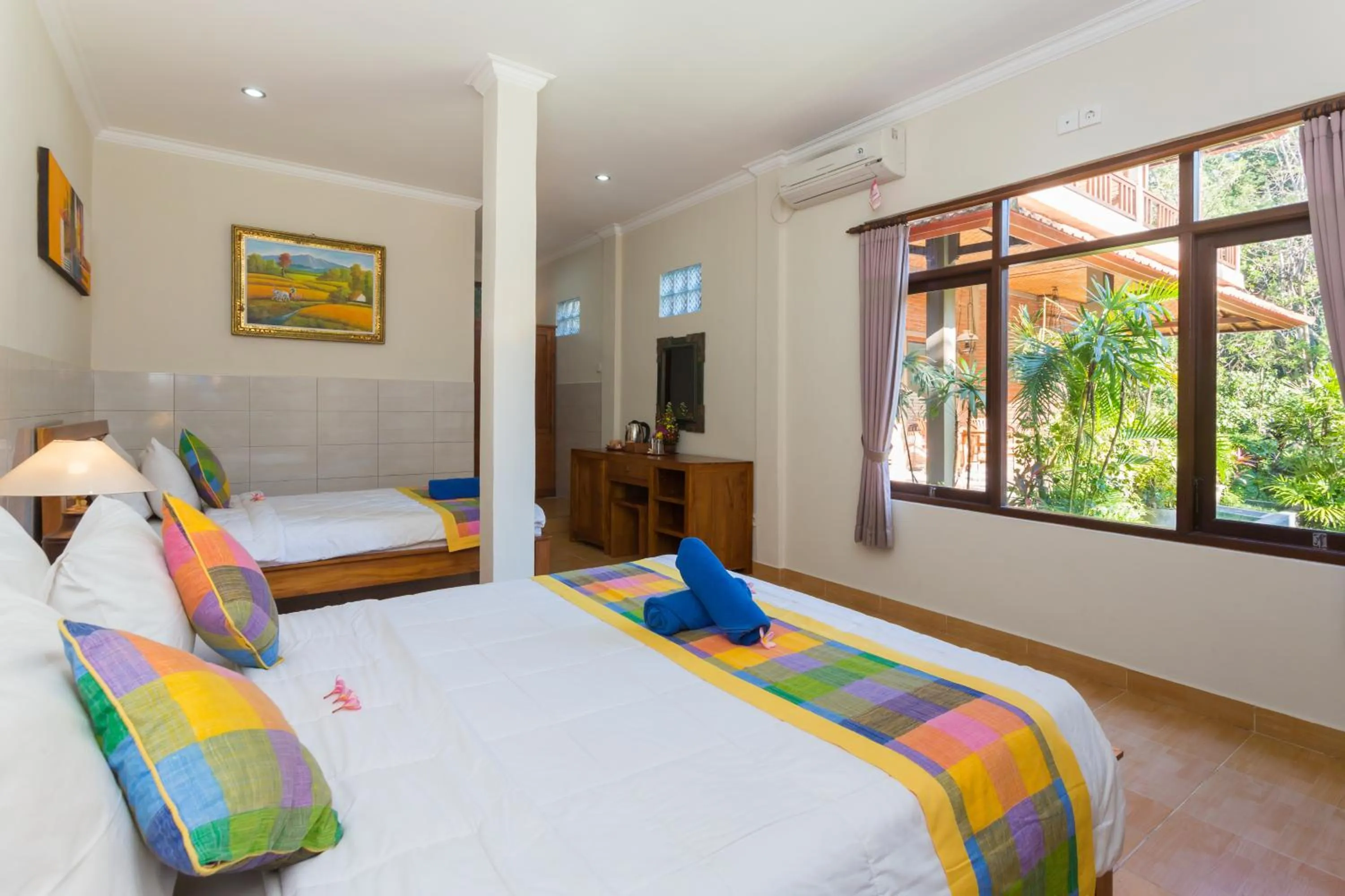 Bed in Wenara Bali Bungalows