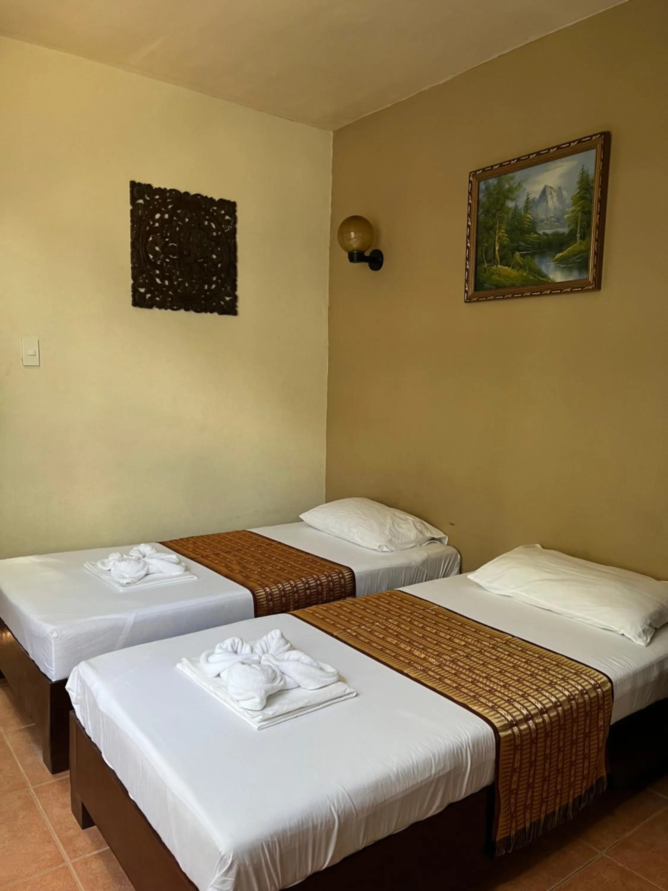 Bed in Boracay Ocean Bay Hotel