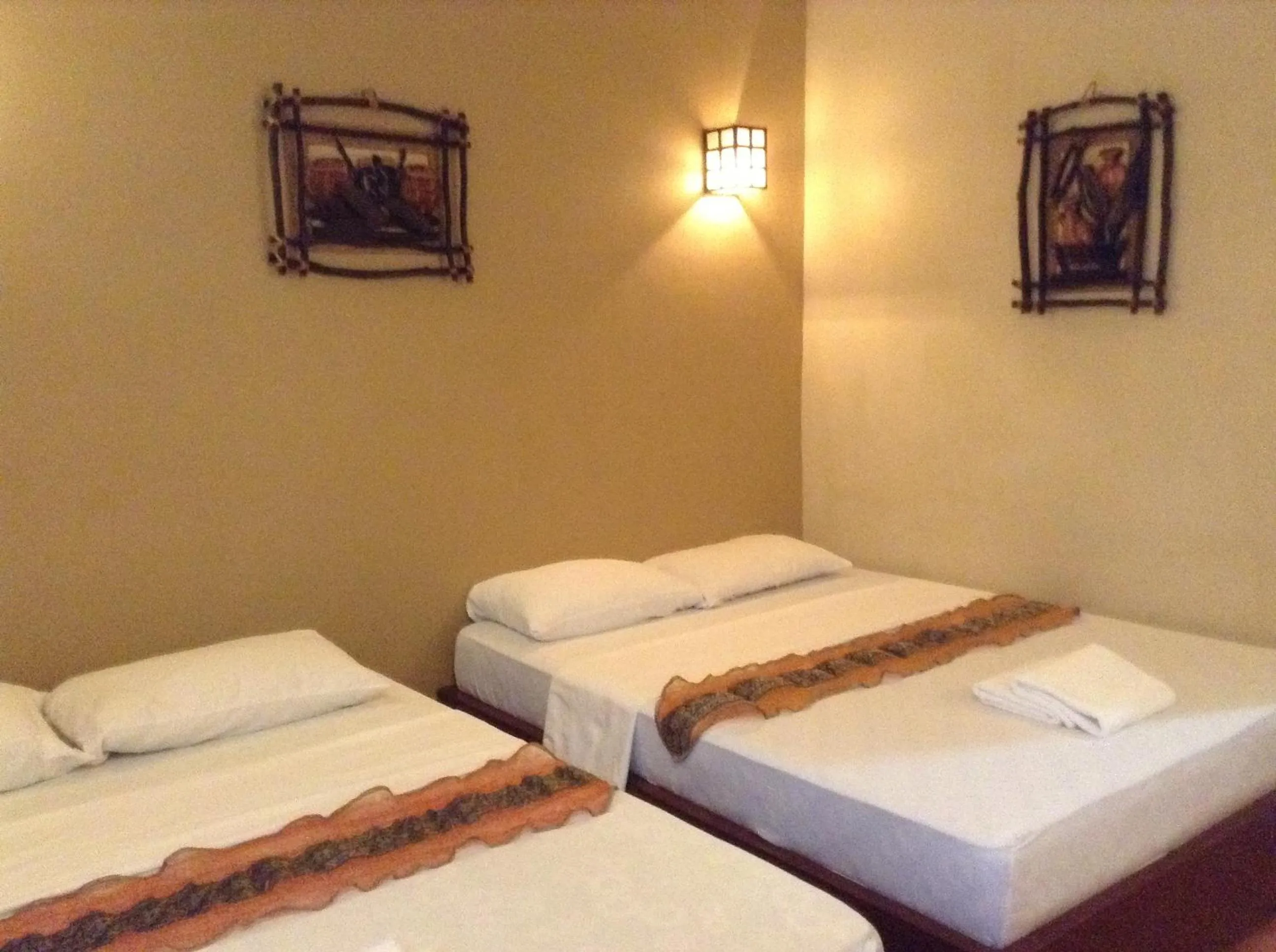 Bed in Boracay Ocean Bay Hotel