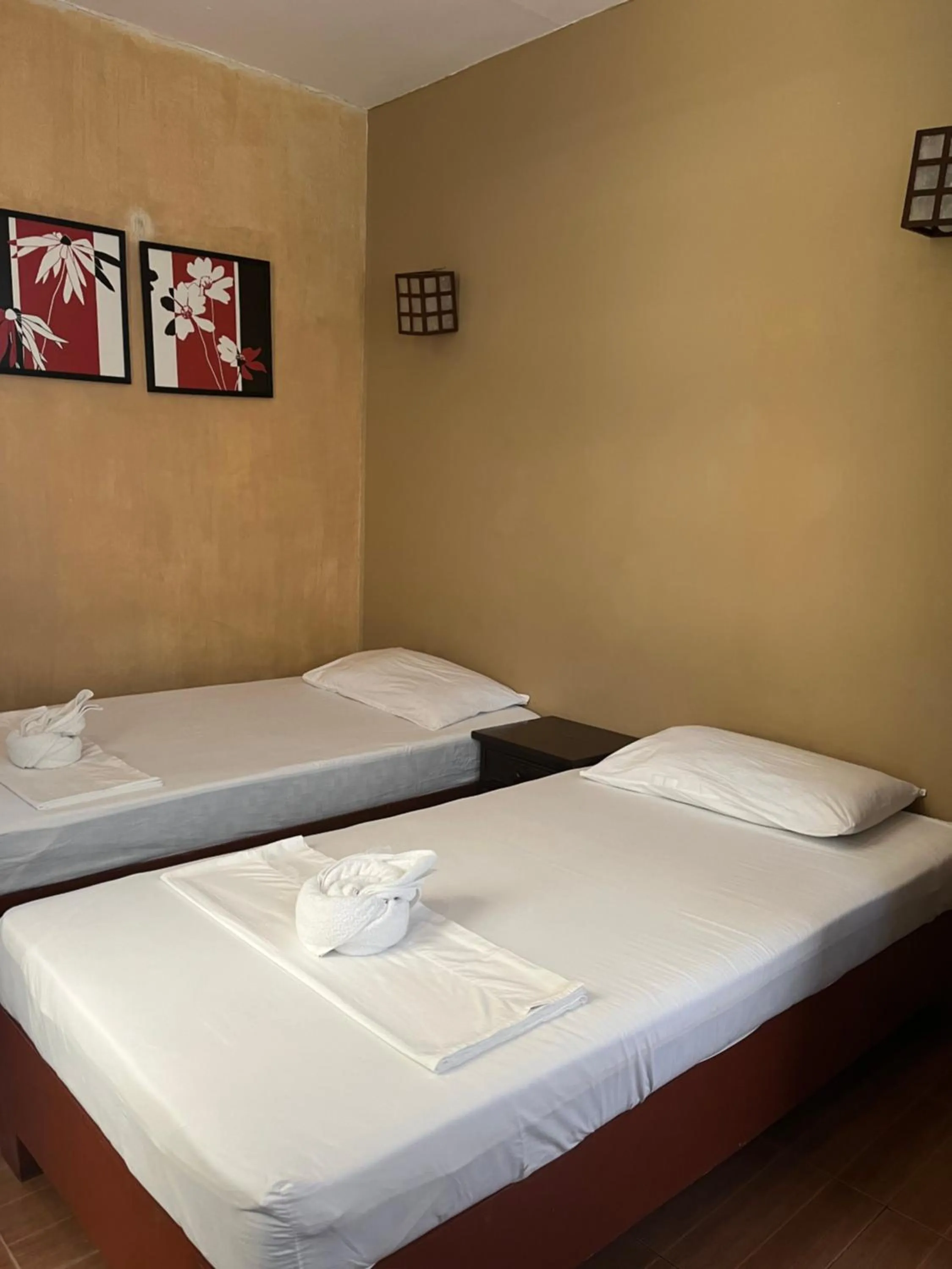 Bed in Boracay Ocean Bay Hotel