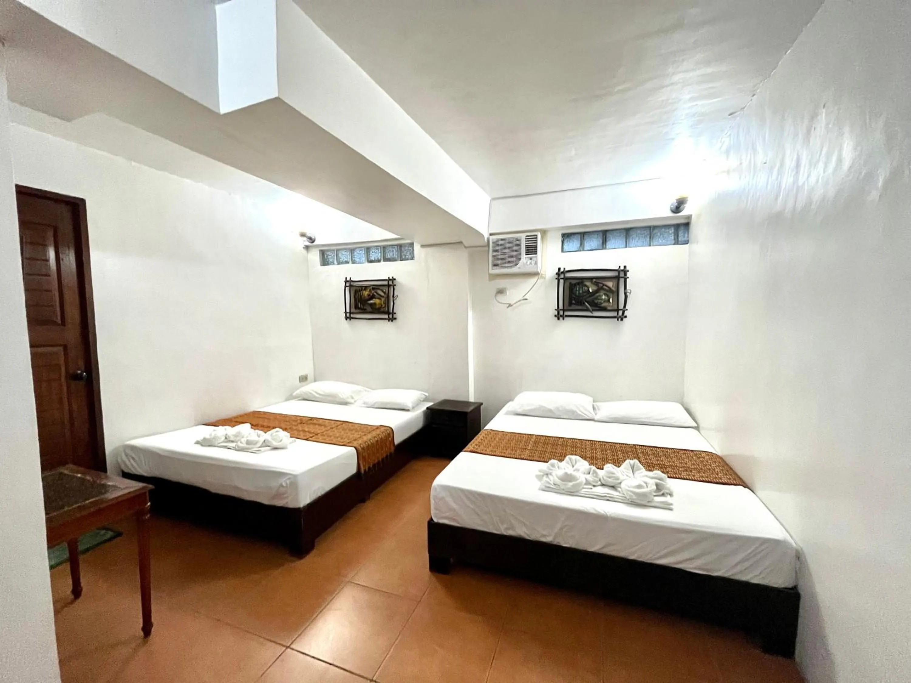 Bed in Boracay Ocean Bay Hotel