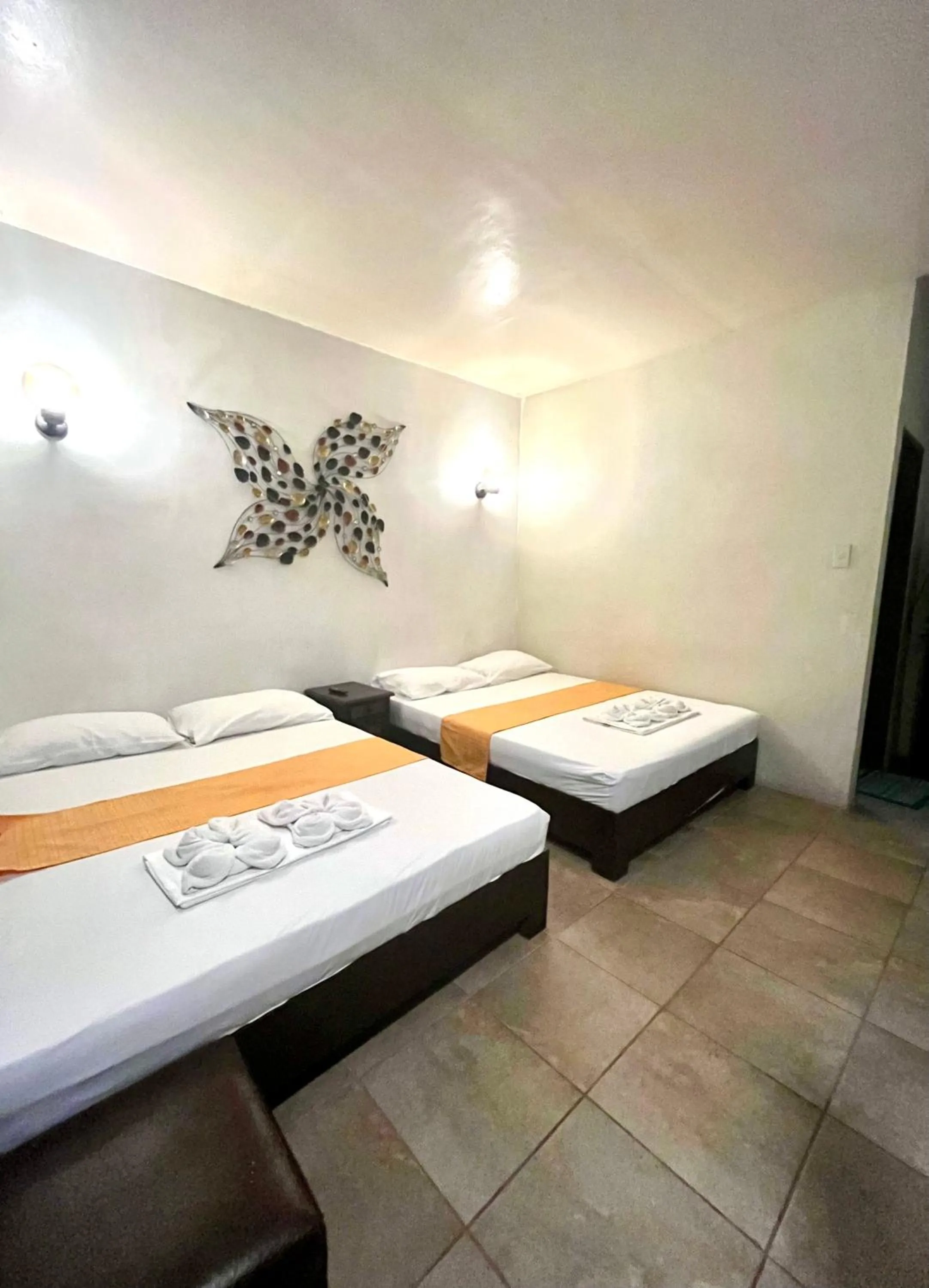 Bed in Boracay Ocean Bay Hotel