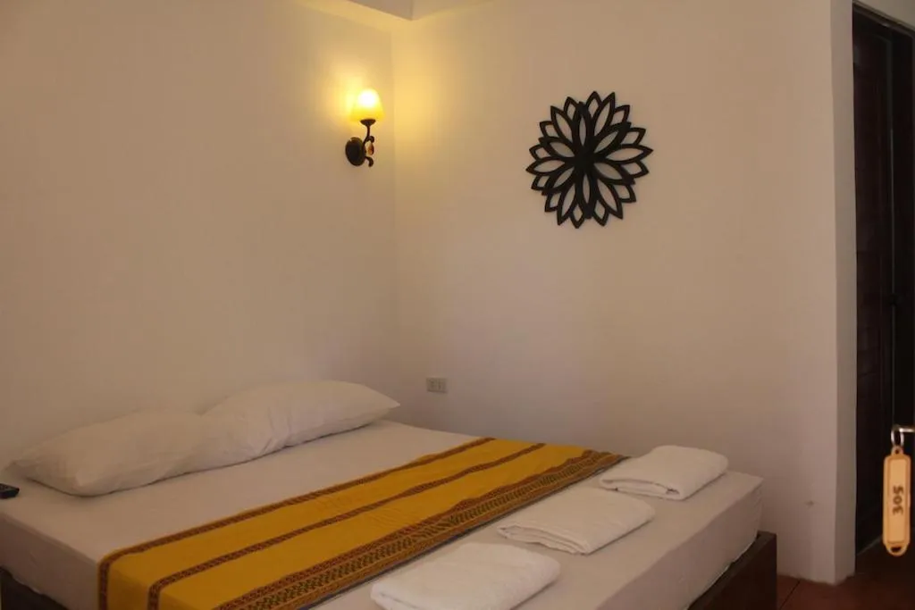 Bed in Boracay Ocean Bay Hotel