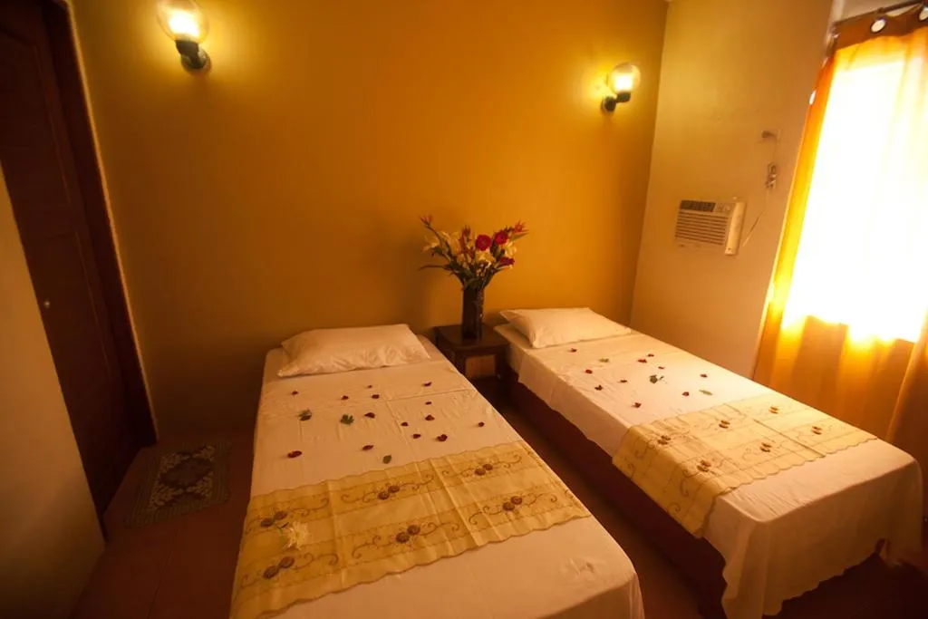 Bed in Boracay Ocean Bay Hotel