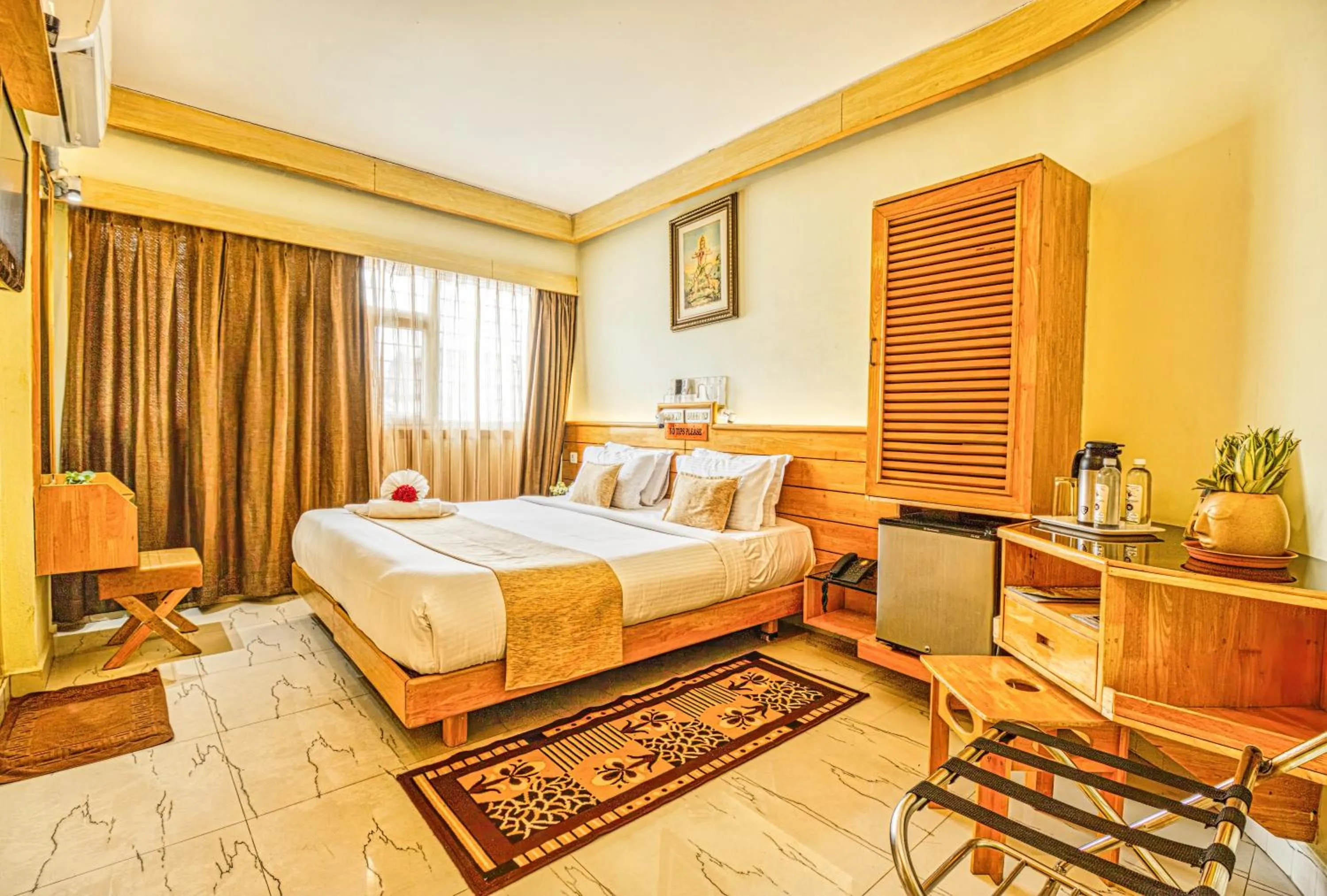 Bed in Parklane Hotel