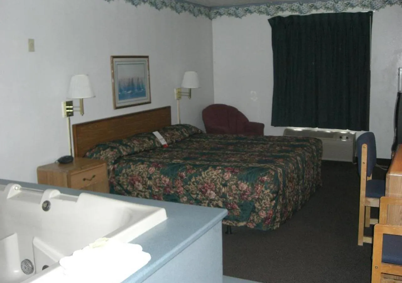 Bedroom in Norwood Inn and Suites - Minneapolis-St Paul Roseville