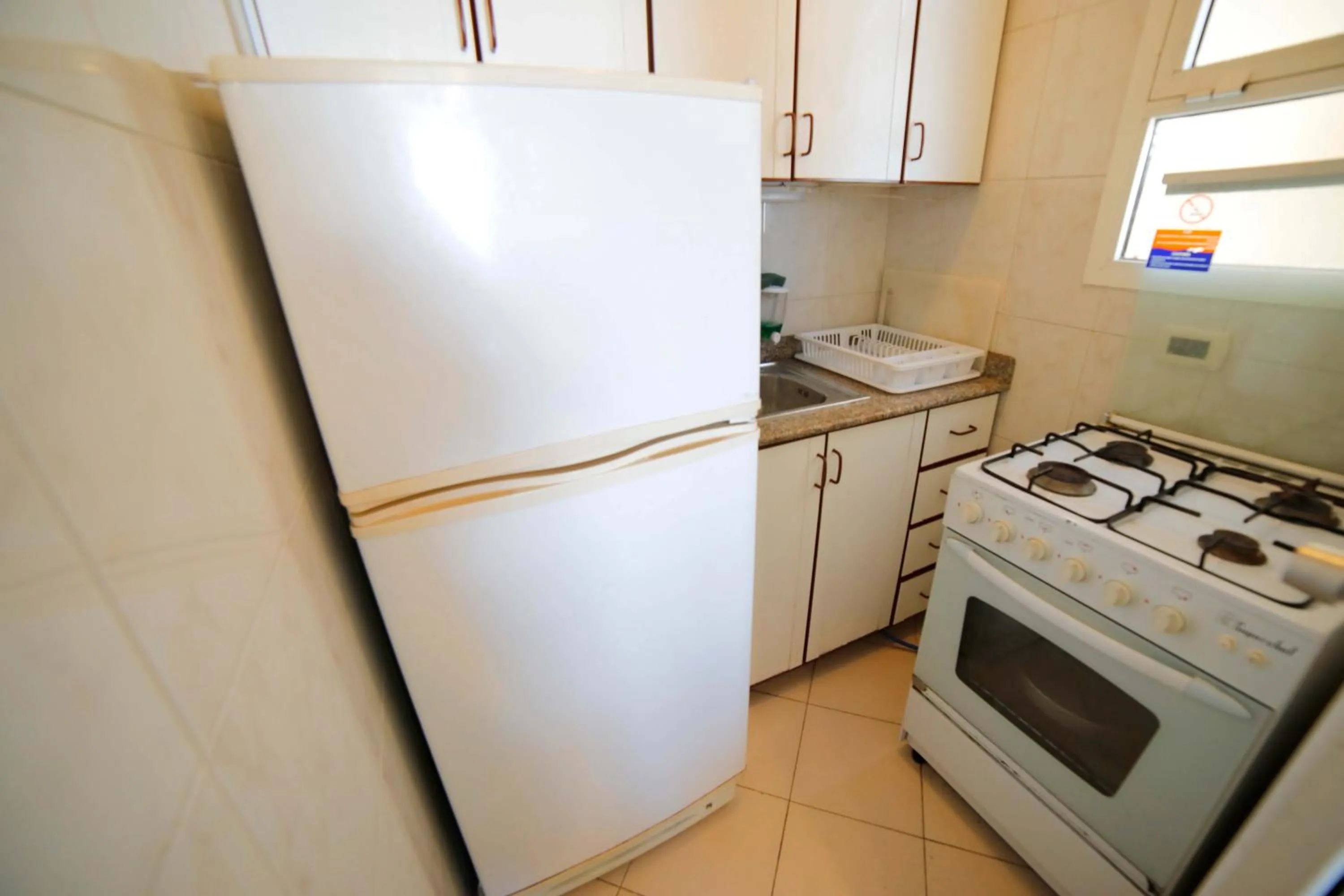 Kitchen or kitchenette in Holiday Home Suites