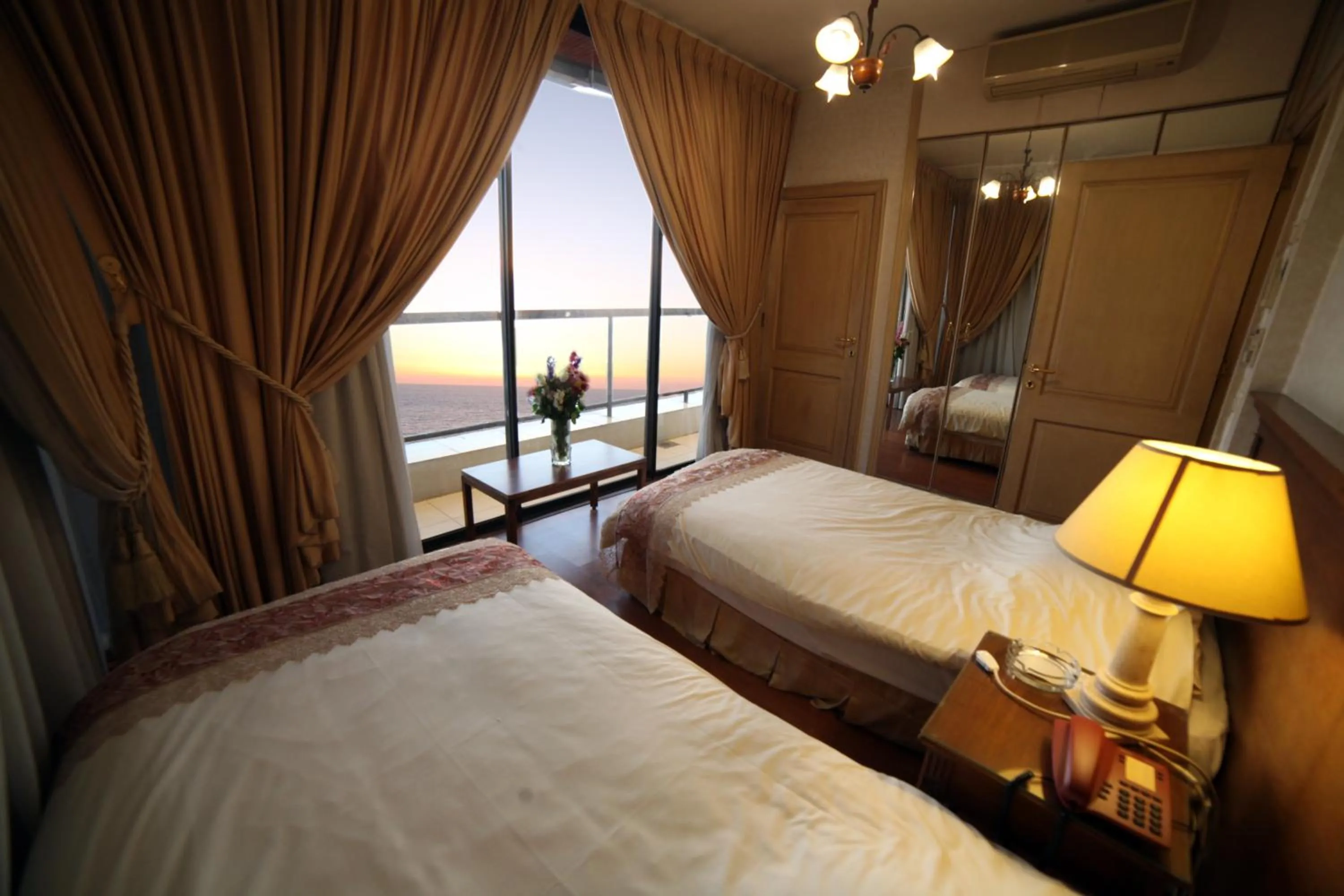 Bed in Holiday Home Suites