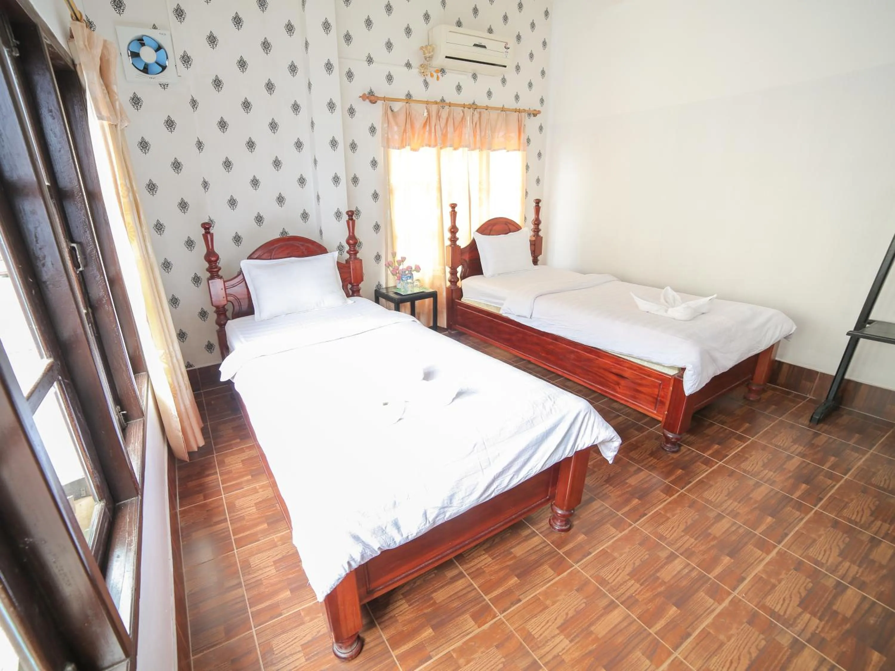 Bed in Maylay Guesthouse