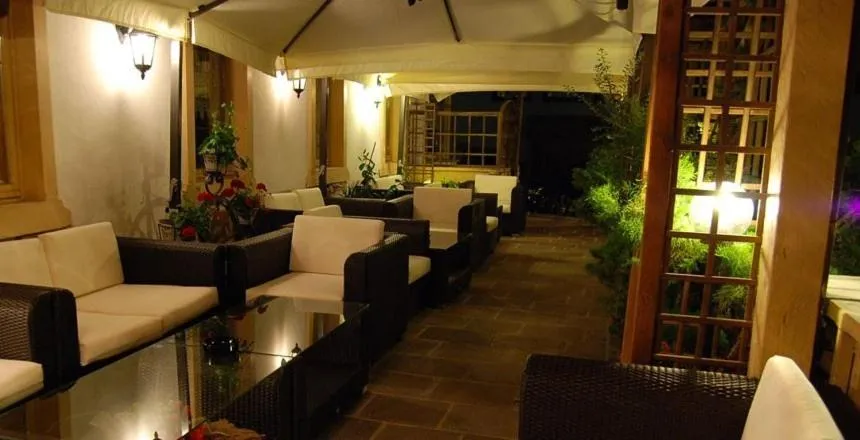 Communal lounge/ TV room in Albergo Genziana