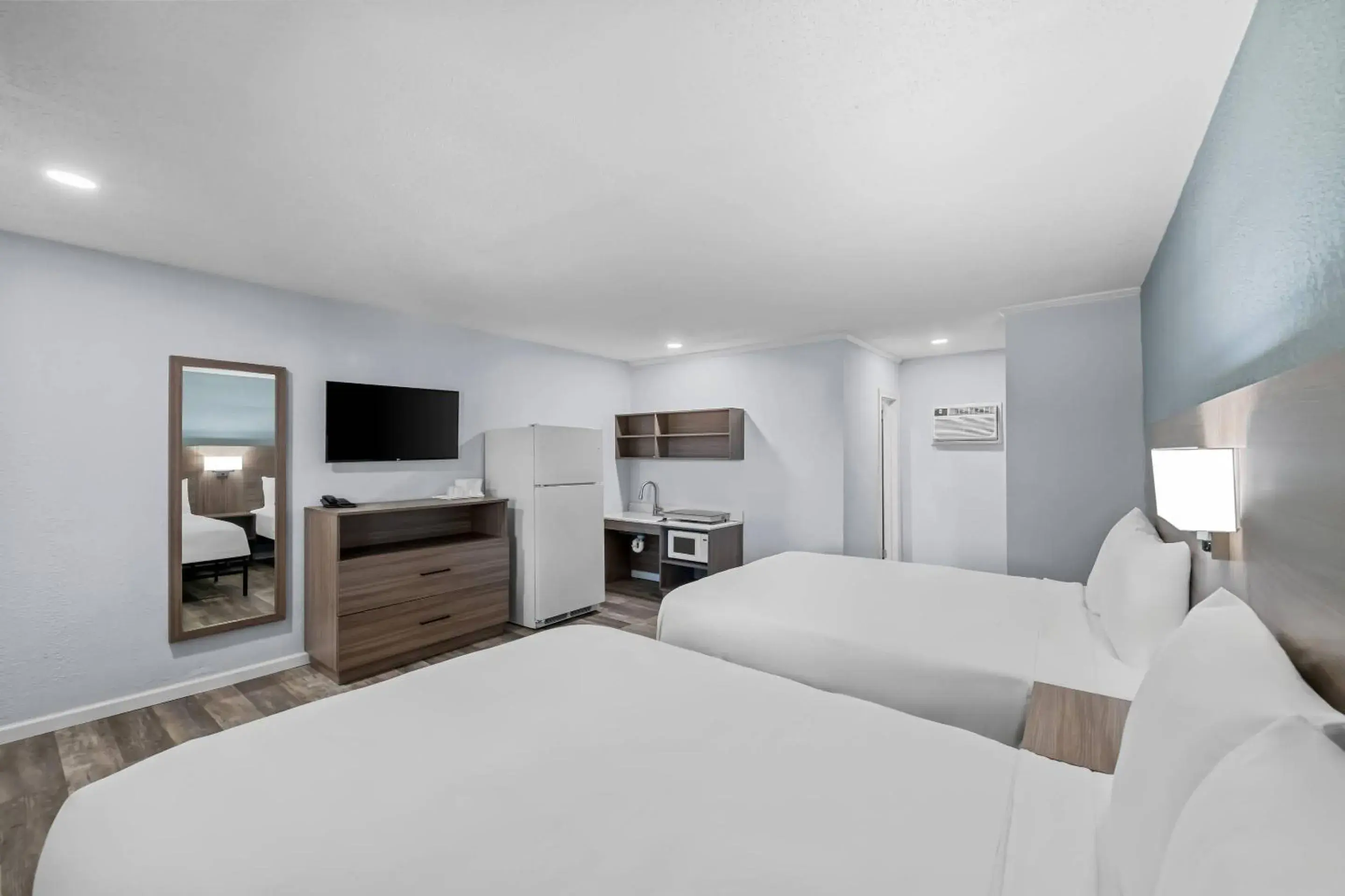 Efficiency Quadruple Room with Two Queen Beds - Non Smoking/Exterior Hall in Suburban Studios Newport News - Hampton Efficiency Quadruple Room with Two Queen Beds - Non Smoking/Exterior Hall in Suburban Studios Newport News - Hampton