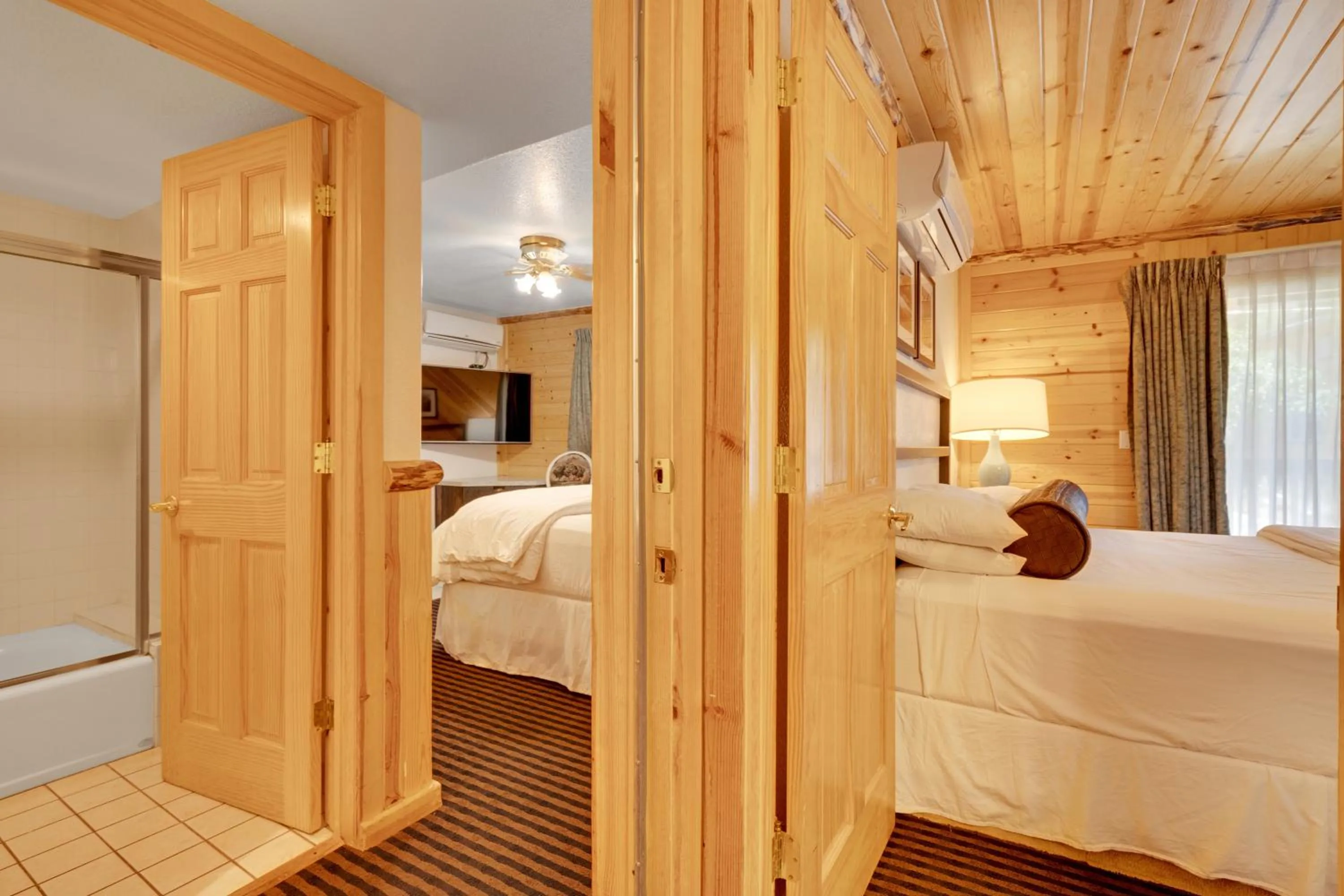 Bed in 3 Peaks Resort & Beach Club