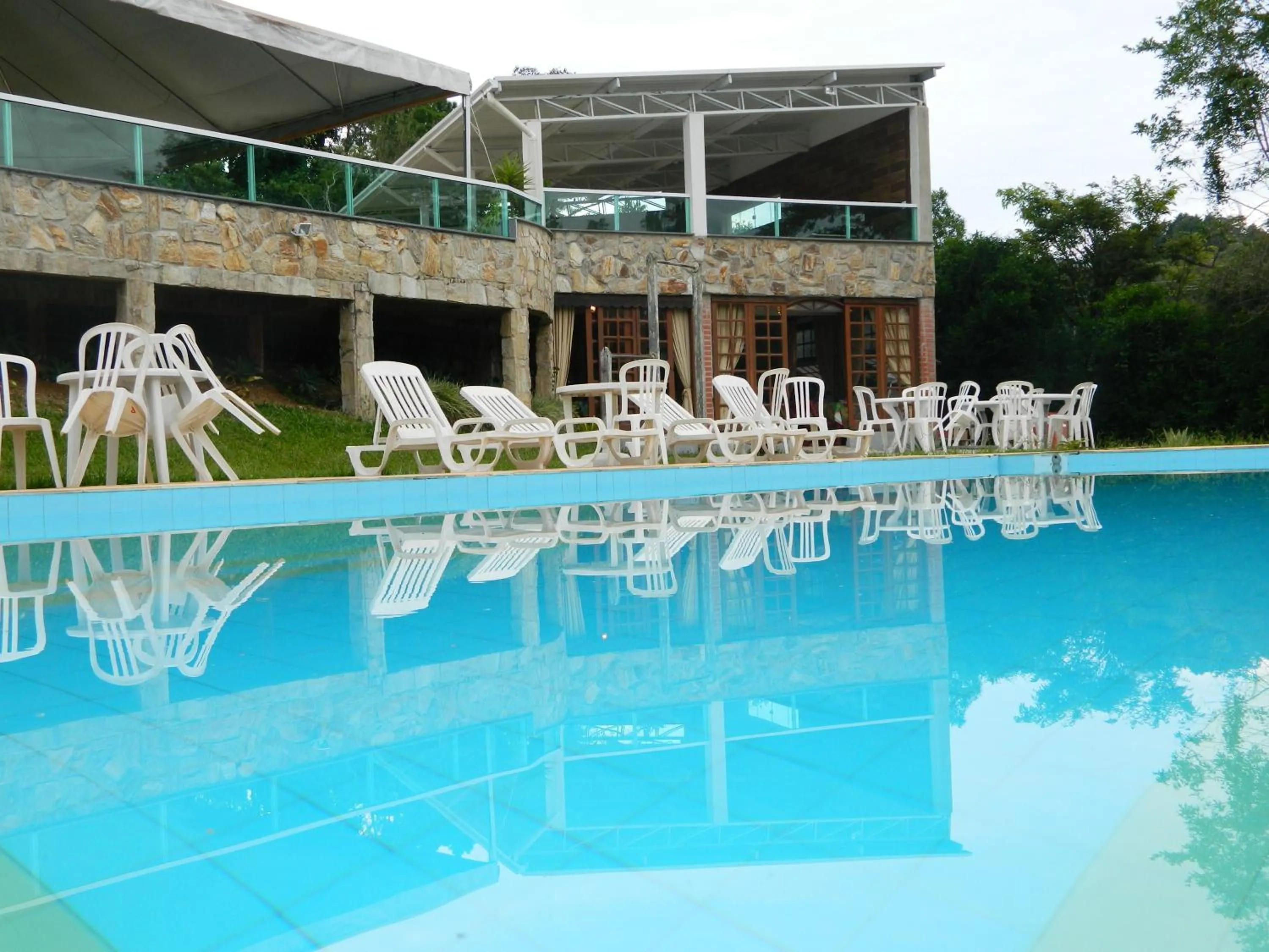 Swimming pool in Pousada Aconchego de Minas