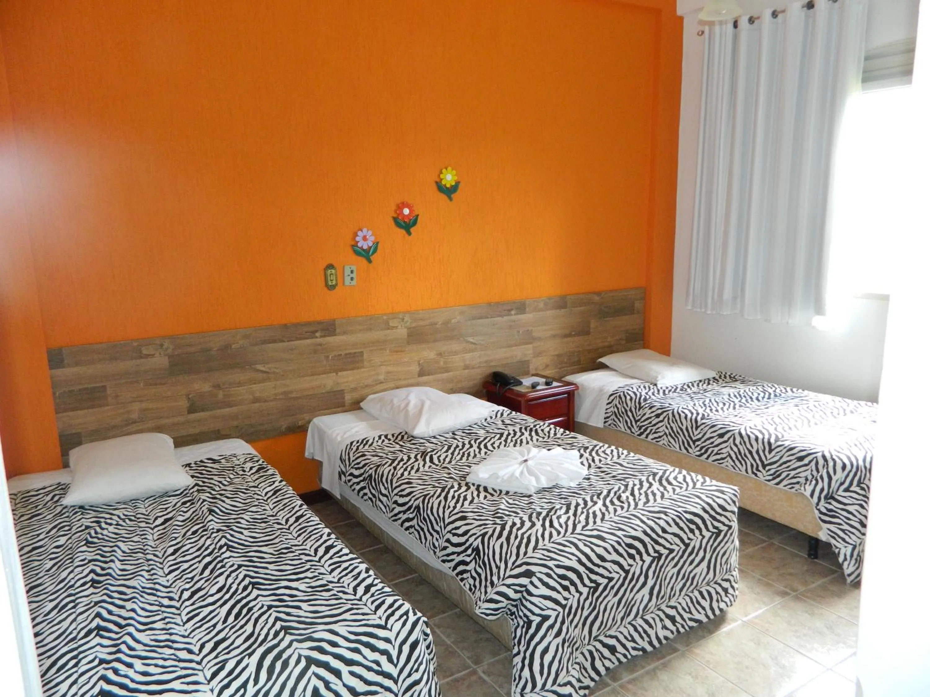 Photo of the whole room, Bed in Pousada Aconchego de Minas