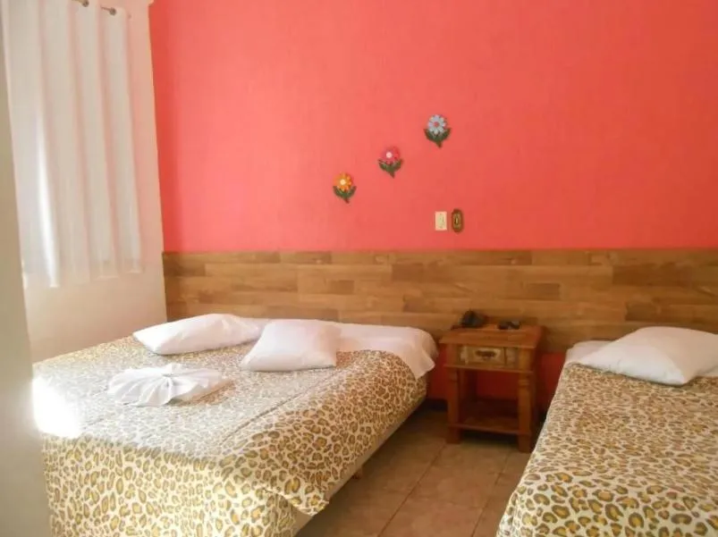 Bed in Pousada Aconchego de Minas